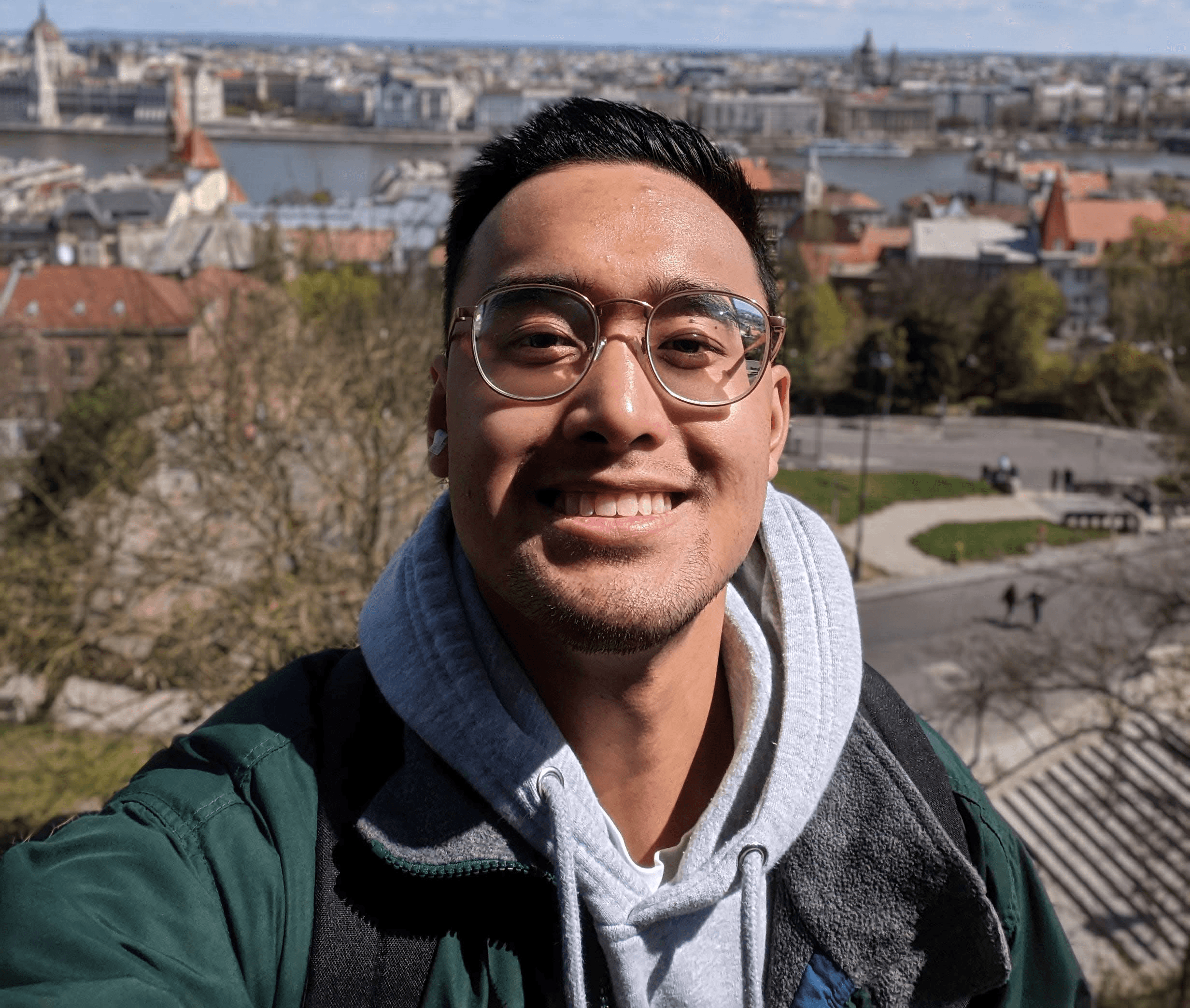 Ellixs Tulagan smiling with a nature background