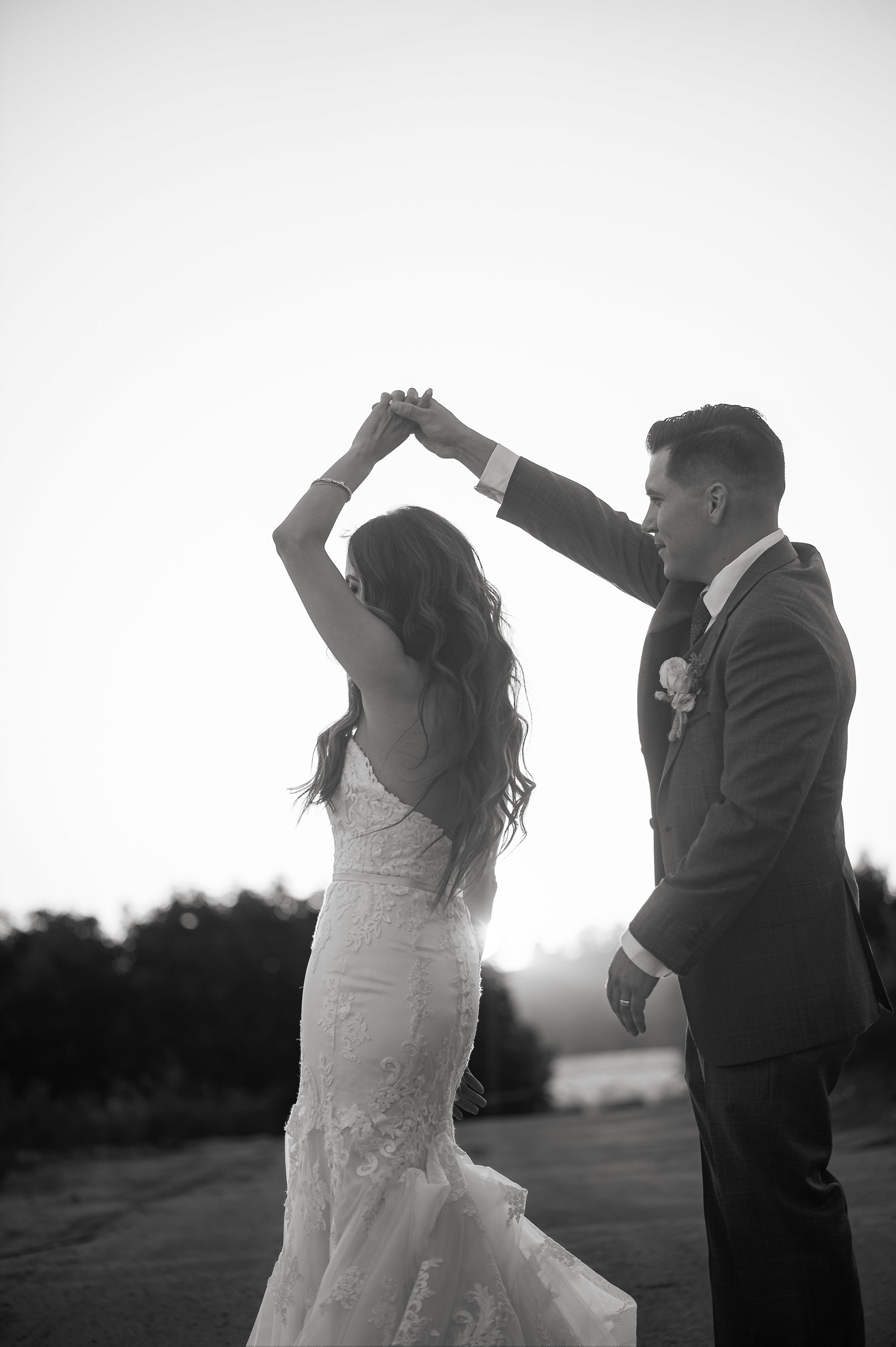 Flat lay wedding details with bouquet, rings, and sparkling bridal heels