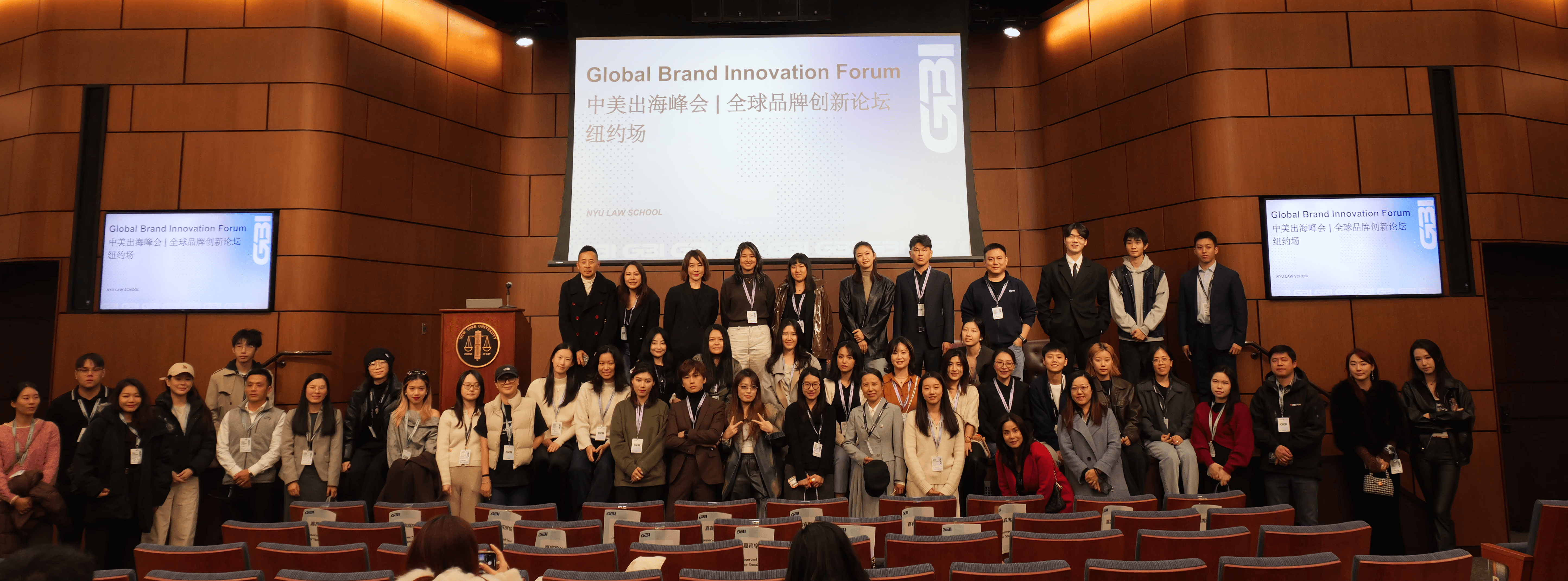 five children smiling while doing peace hand sign
