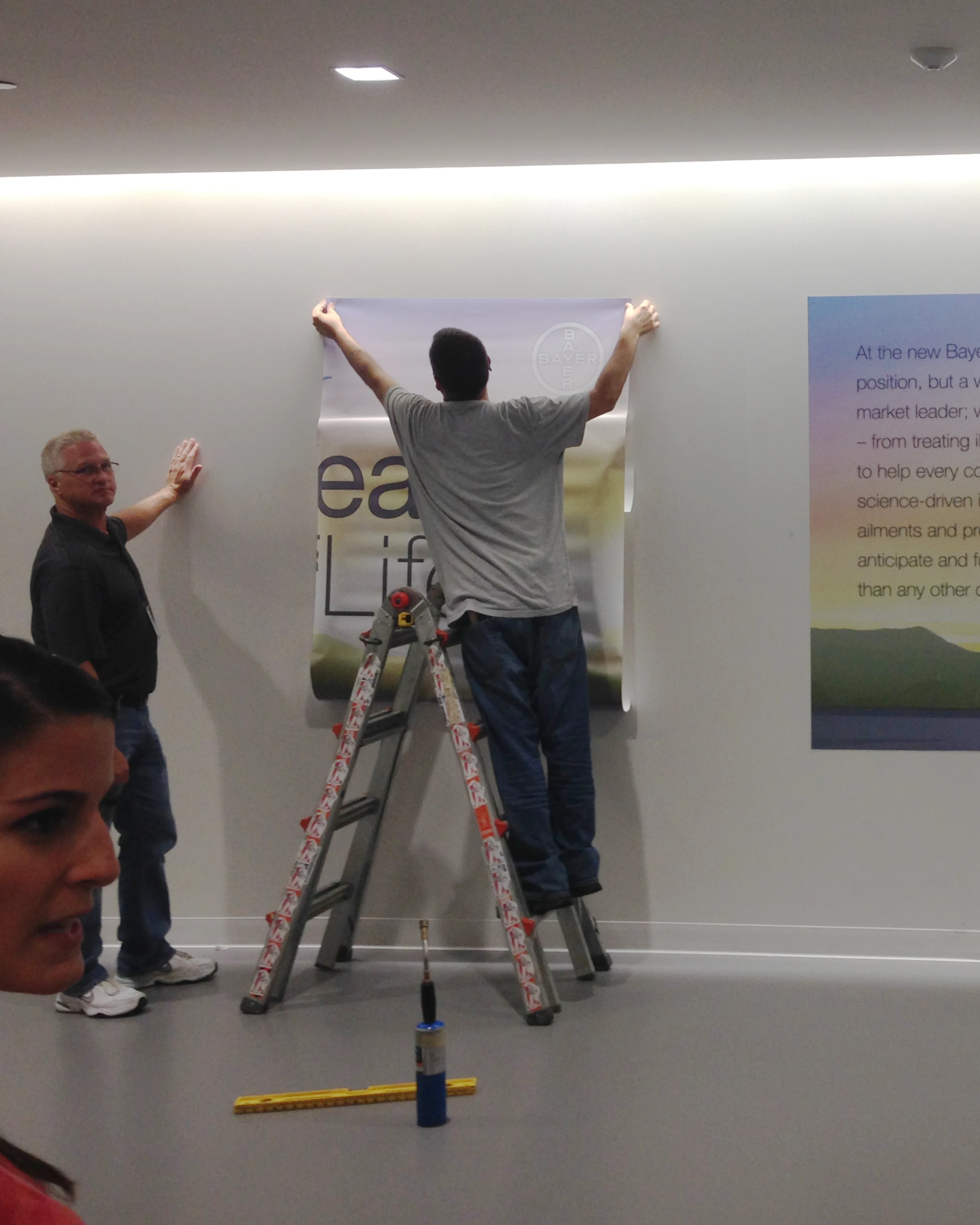 Bayer employees transform Bayer Consumer Care's US headquarters during the merger simulcast event