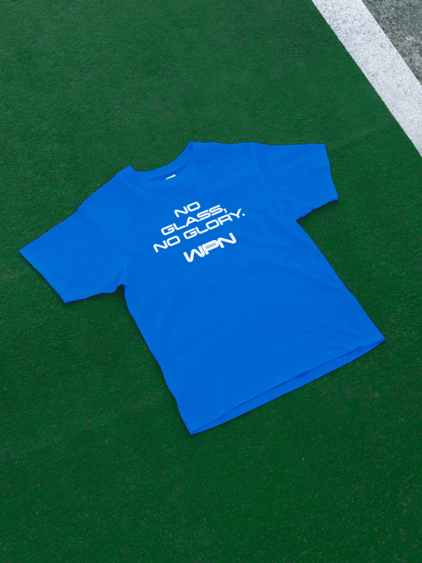 World Padel Network — Blue T-shirt with WPN slogan printed on front — Merchandise application