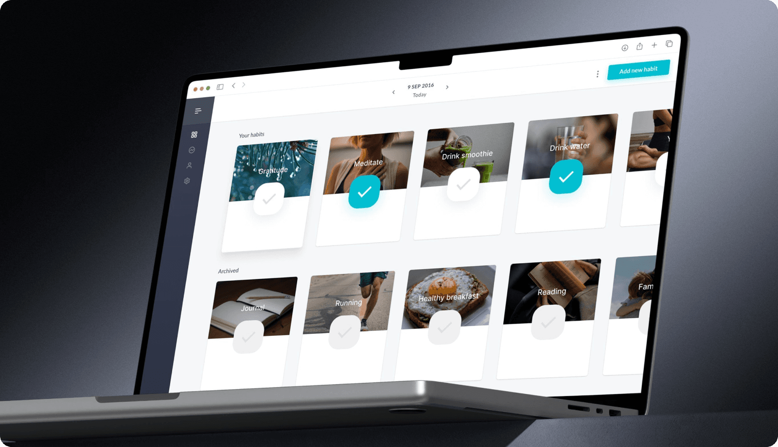 Habit-tracking dashboard on a laptop with completed and archived habits.