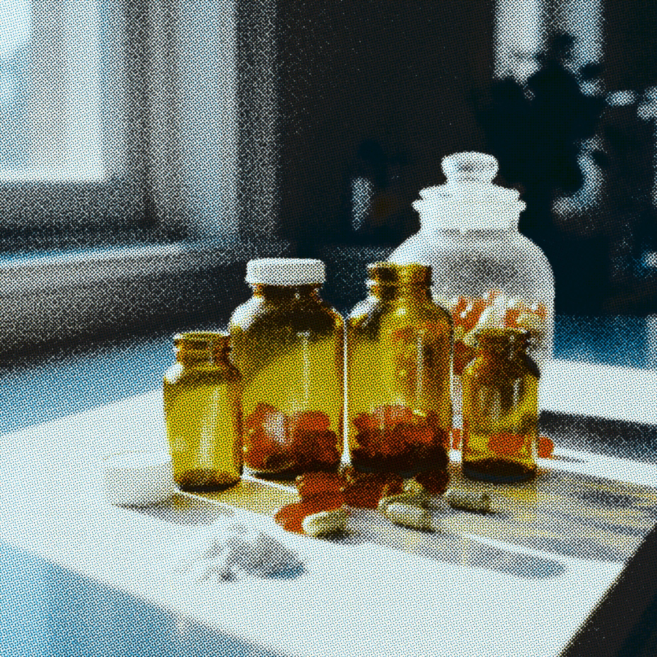 Close-up of hands working with equipment, representing the challenges and realities of building and managing your own manufacturing operations.