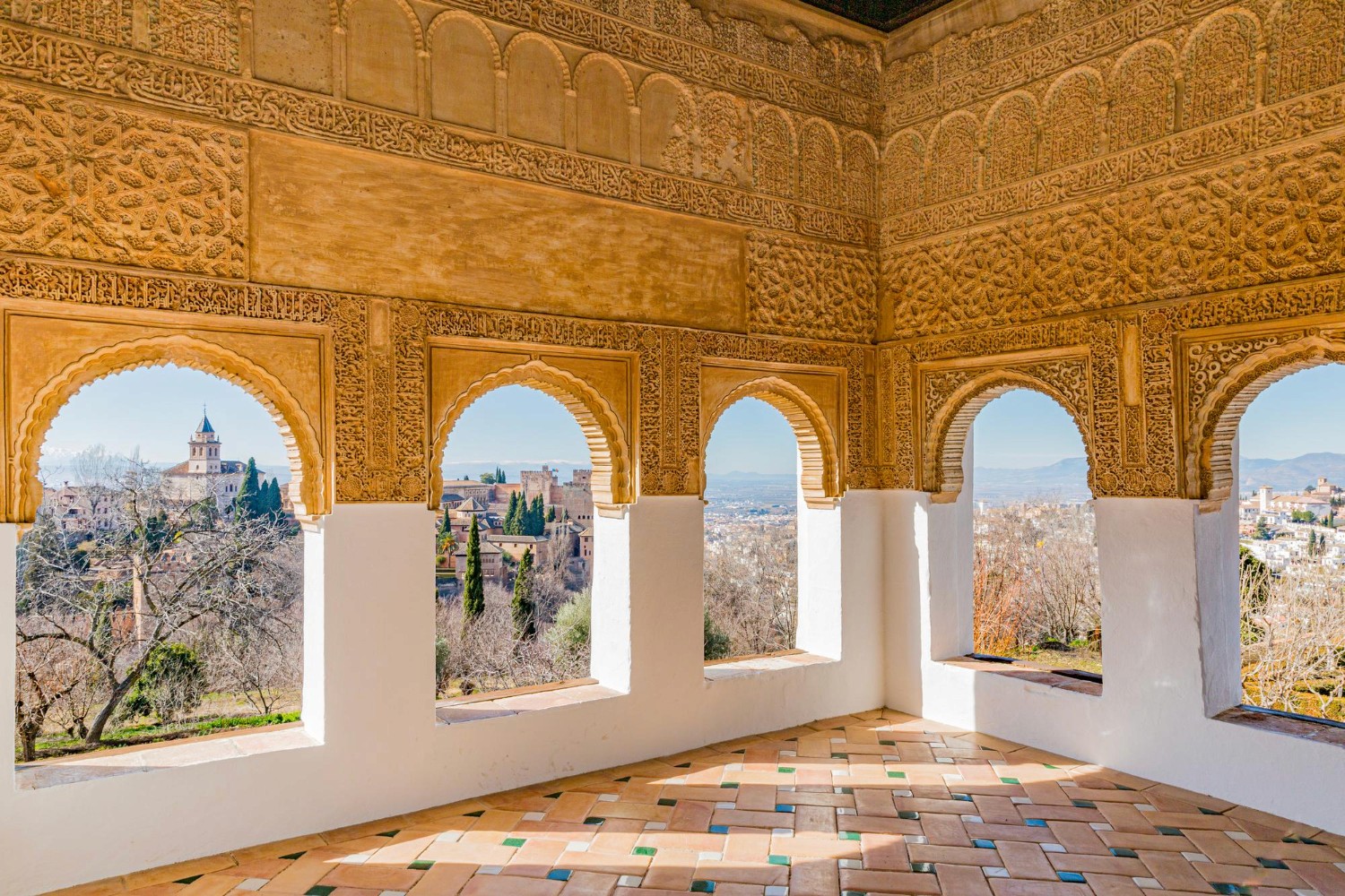 blue and white painted houses on the cliff
