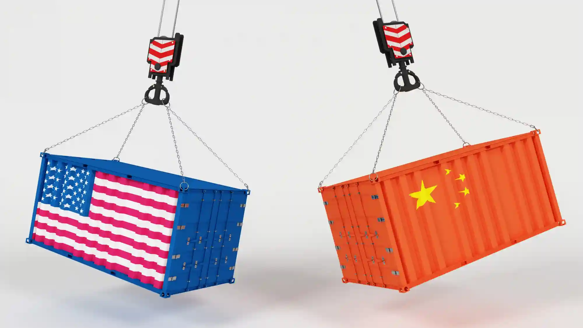 Two shipping containers featuring the American and Chinese flags being lifted, symbolizing global trade and international economic relations.