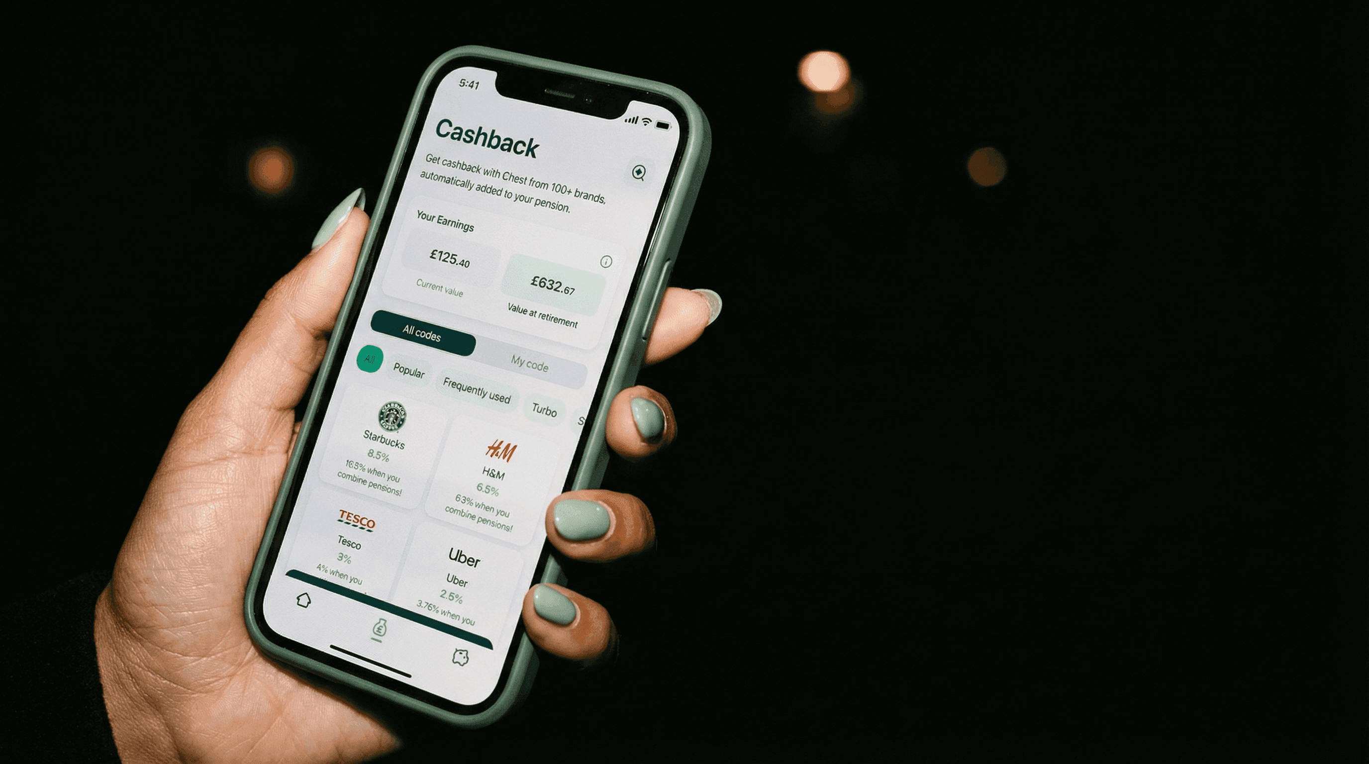 Chest cashback pension app shown on phone held in hand