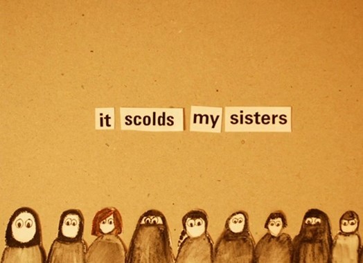 A photo of several pieces of paper arranged to form the text: it scolds my sisters. Also there are drawings of female figures wearing hajib, under the text.