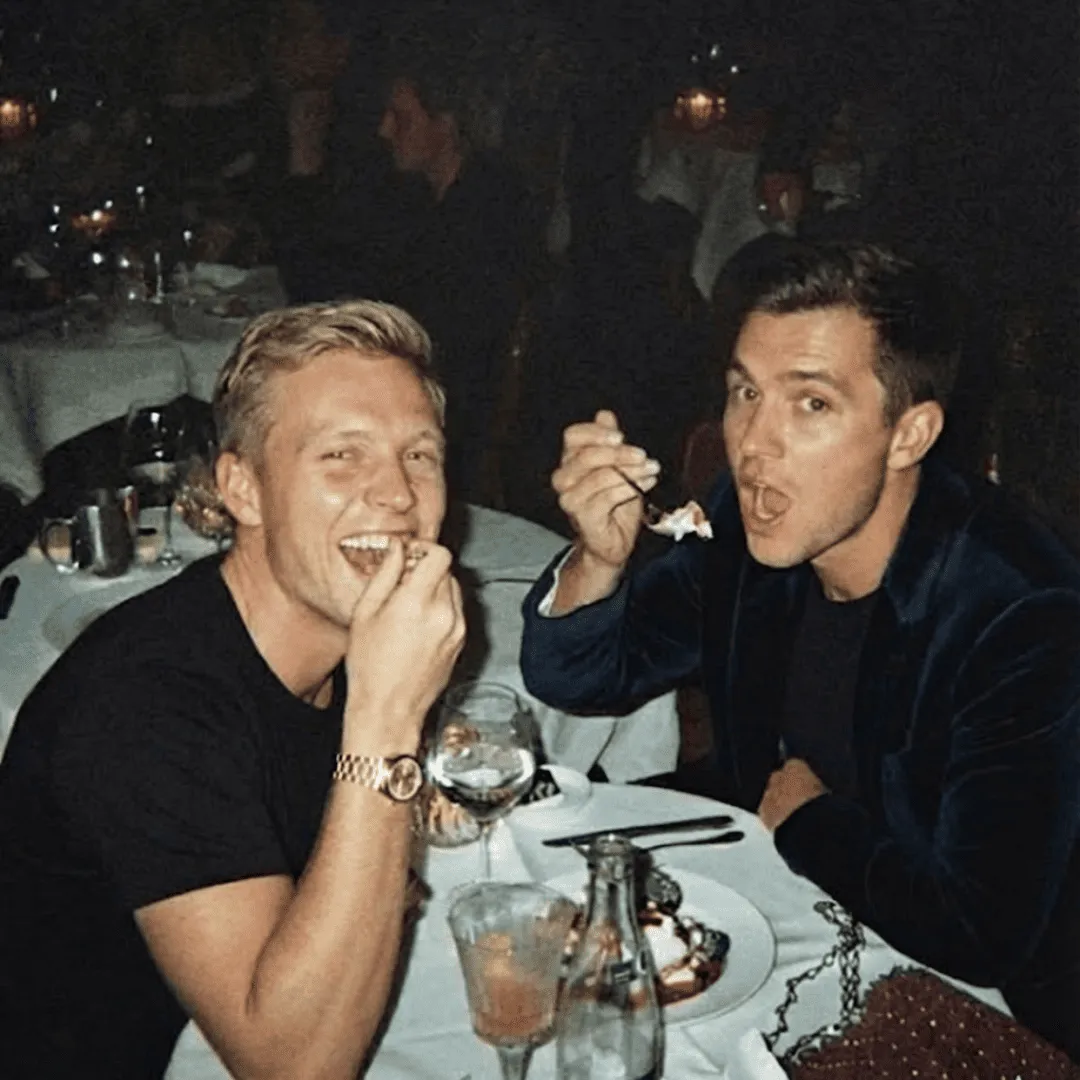 Two men eating dessert at Mingleo dinner