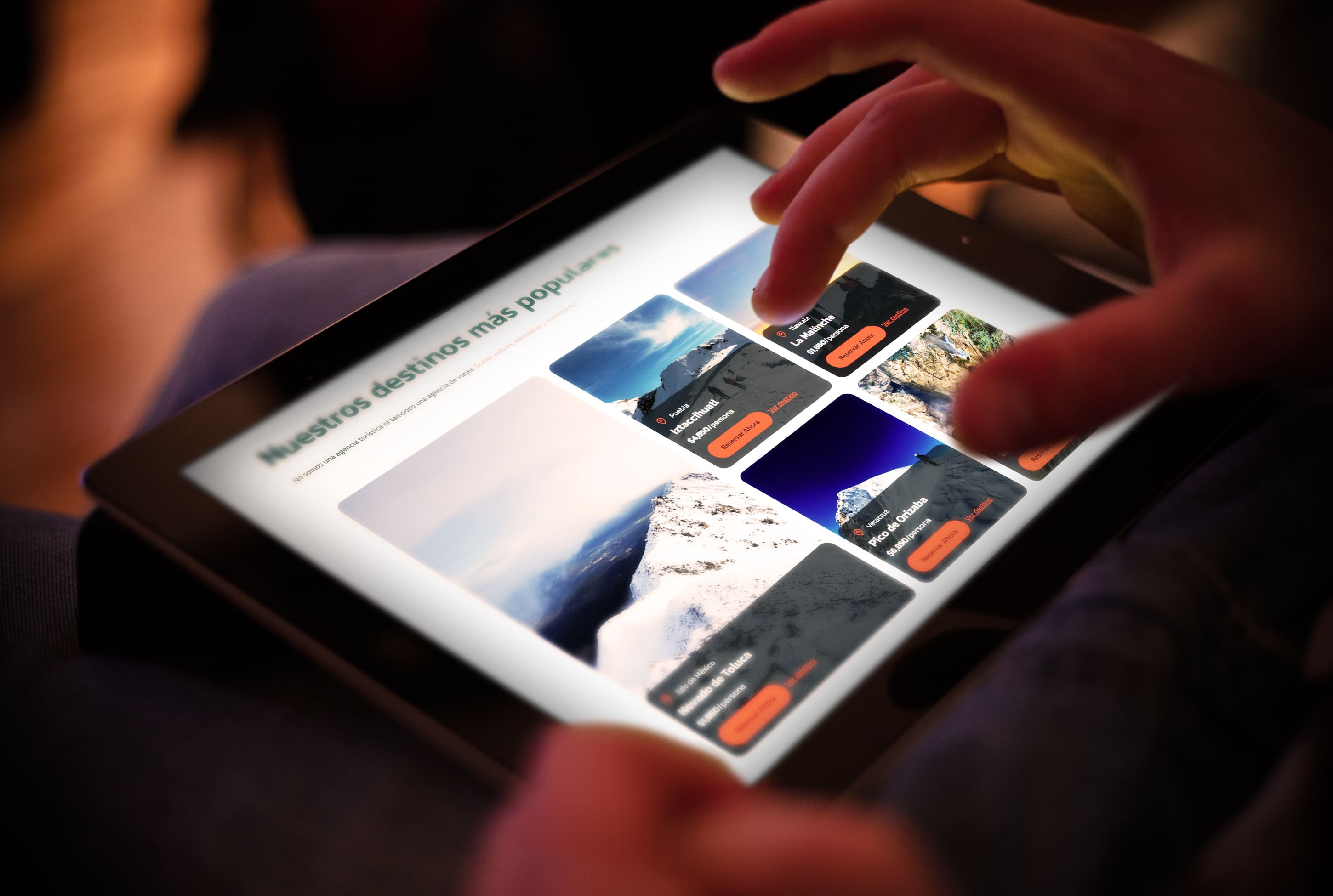 Interior view from living area toward the lake, large glass facade, minimal furniture.