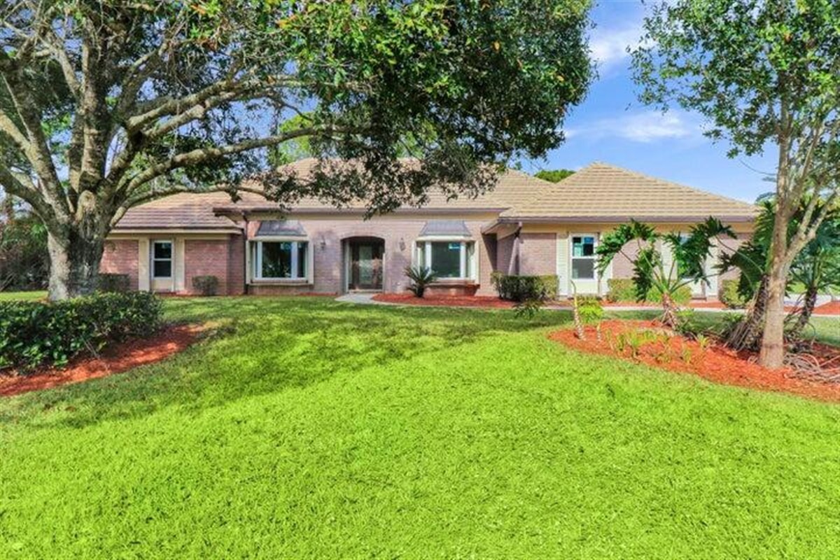 2003 Roof Replacement in Reserve Plantation, PGA Village, Port St Lucie with Entegra Flat Tapershake Tile in Desert Tan