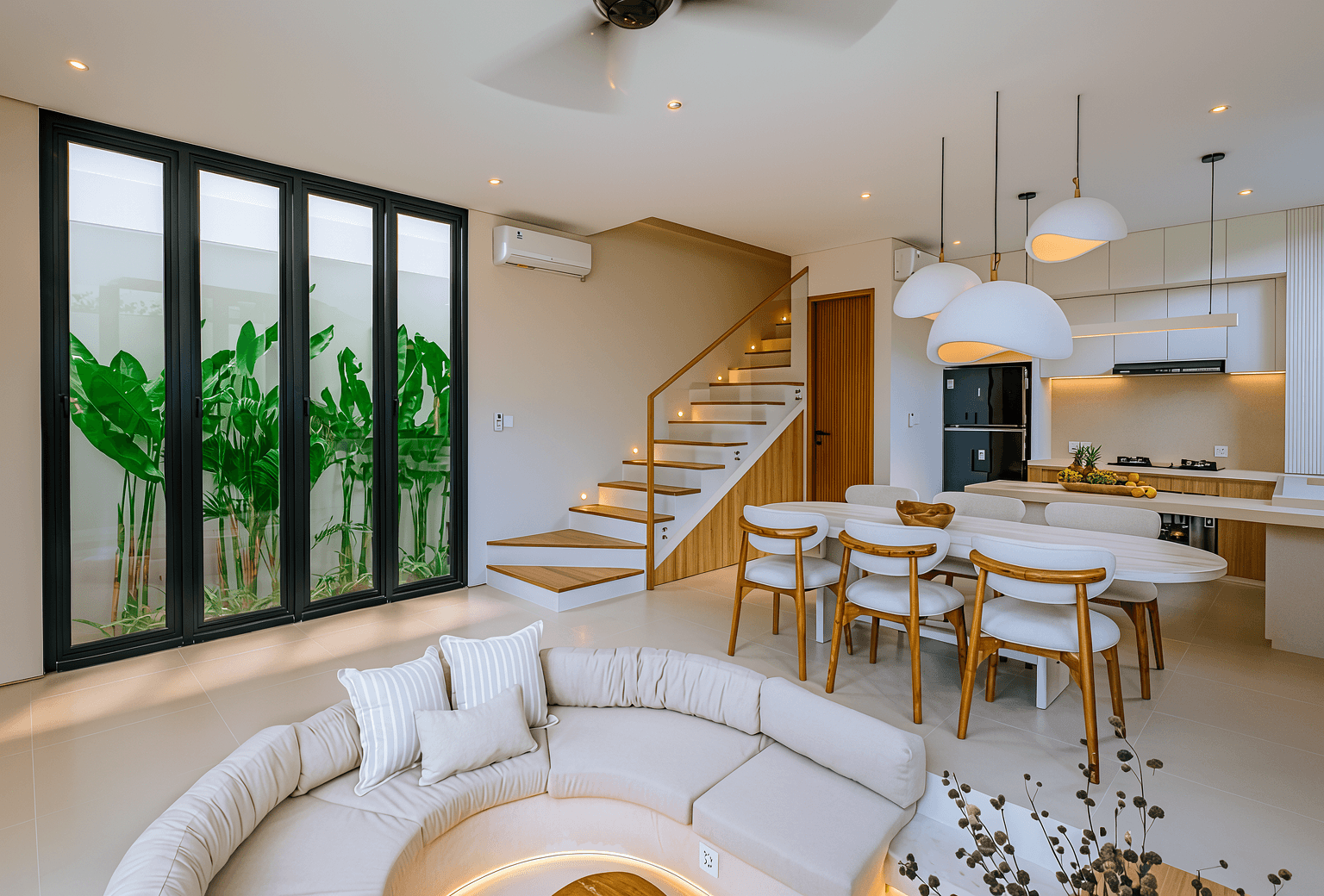 Stylish interior with staircase and open layout in a luxury Bali home, presented by a real estate expert.
