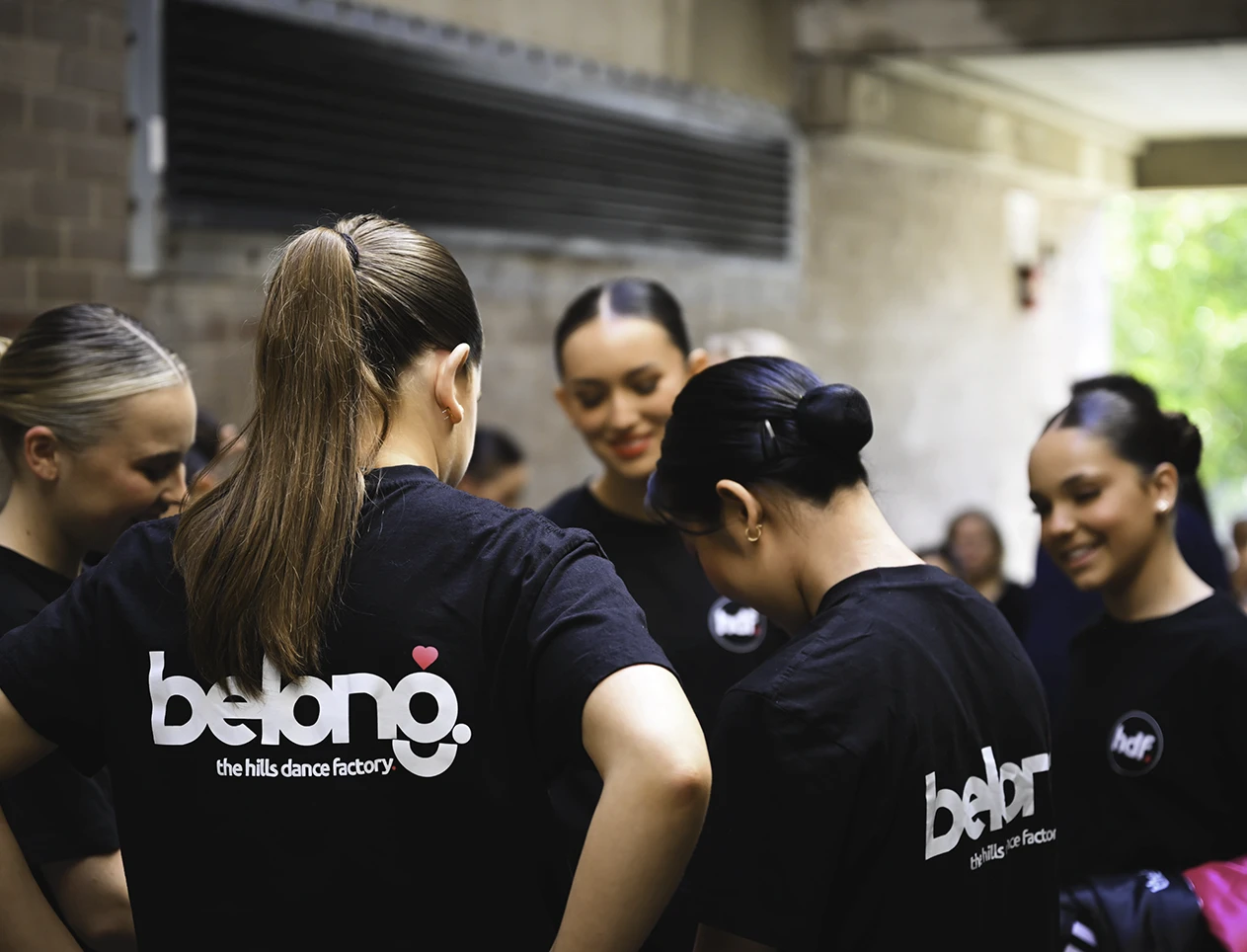 3 tiny tots having fun in front of the camera