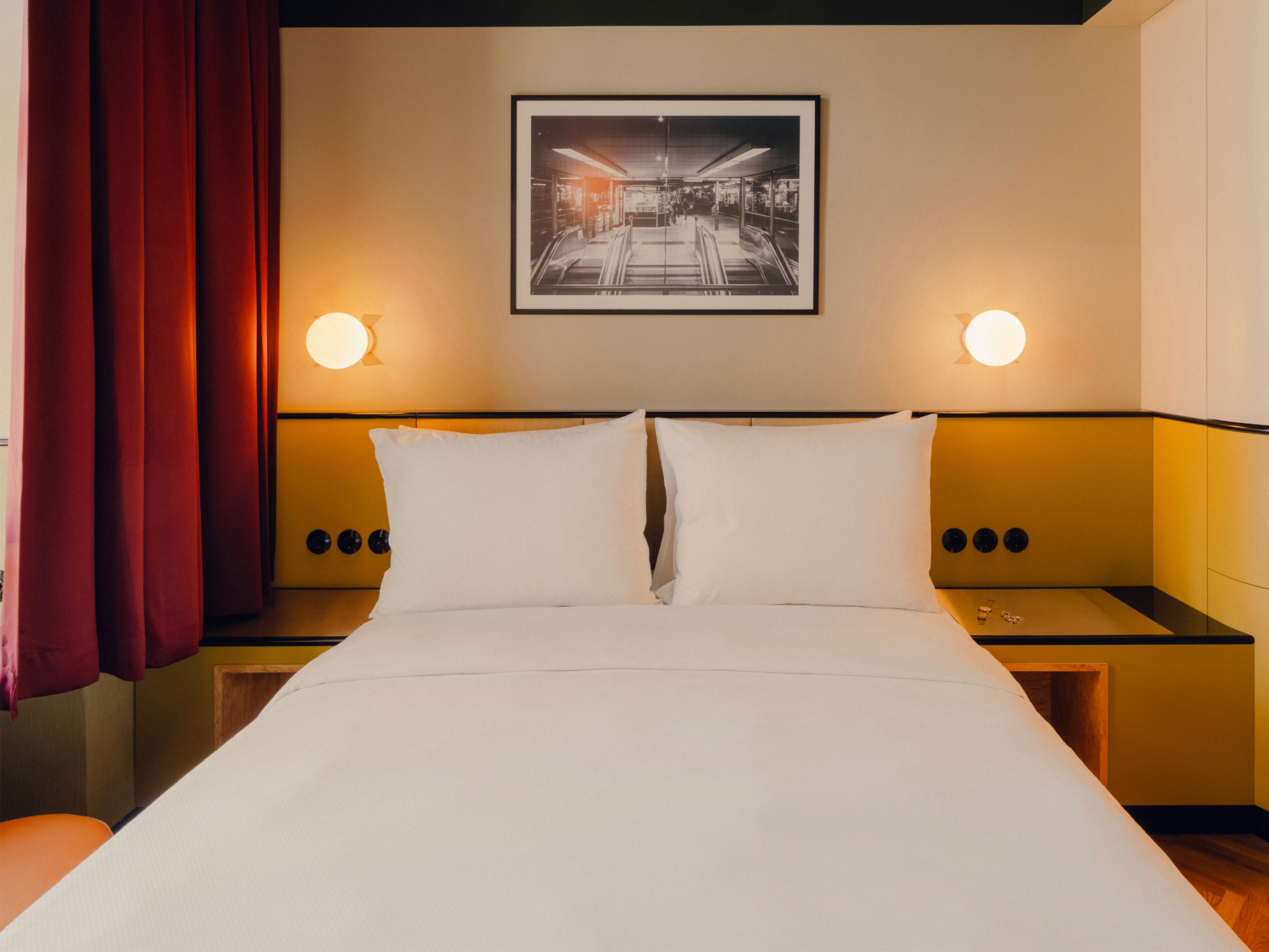 View of the bed at the Muse S room at The Companion Vienna