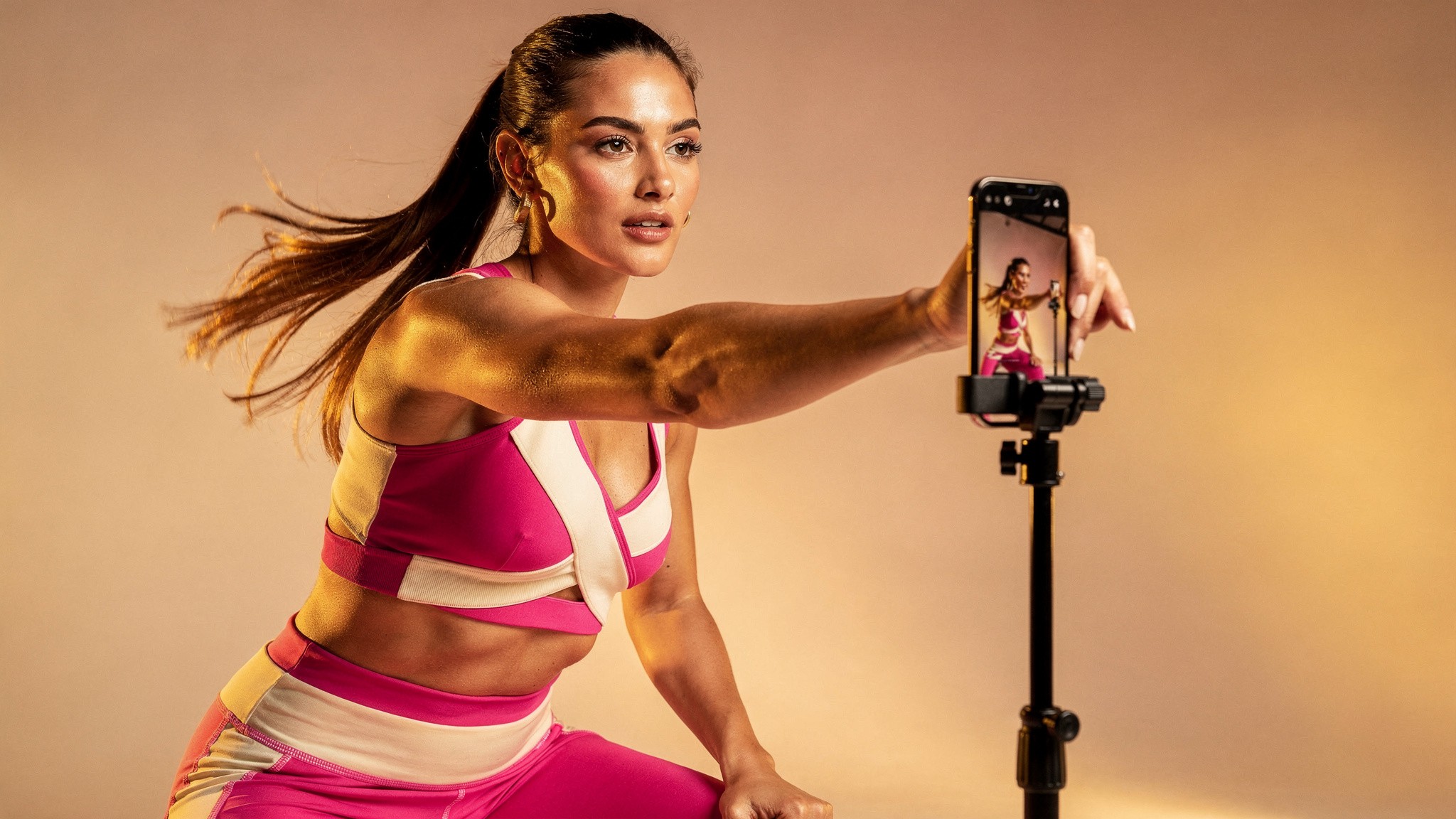 Fitness creator filming a vertical Instagram Reel, where hashtag rules differ slightly from feed posts
