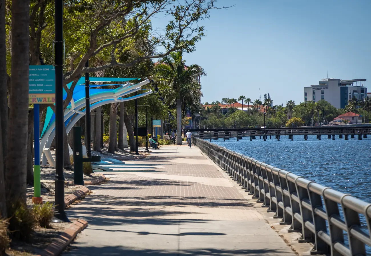 a secene looking down the bradenton riverwalk to the west