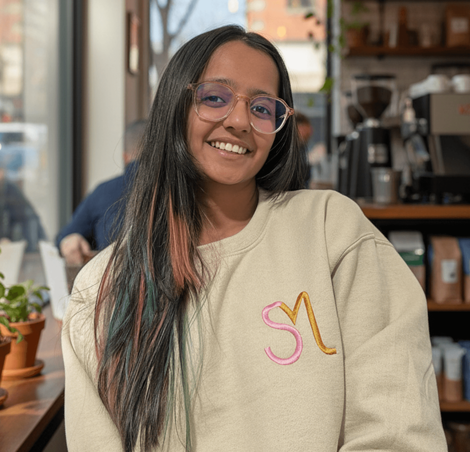 Cheerful dreamy woman with bob hairstyle