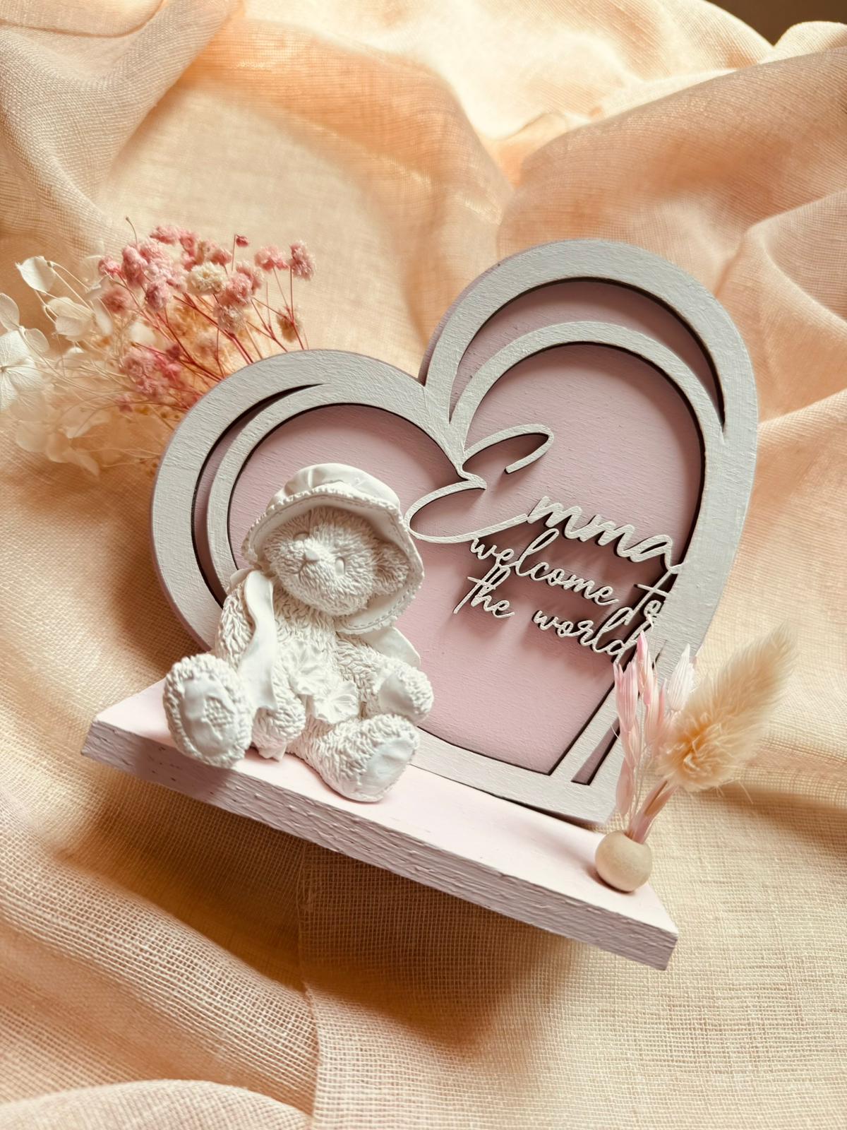 A bride in a lace wedding dress gently holds.