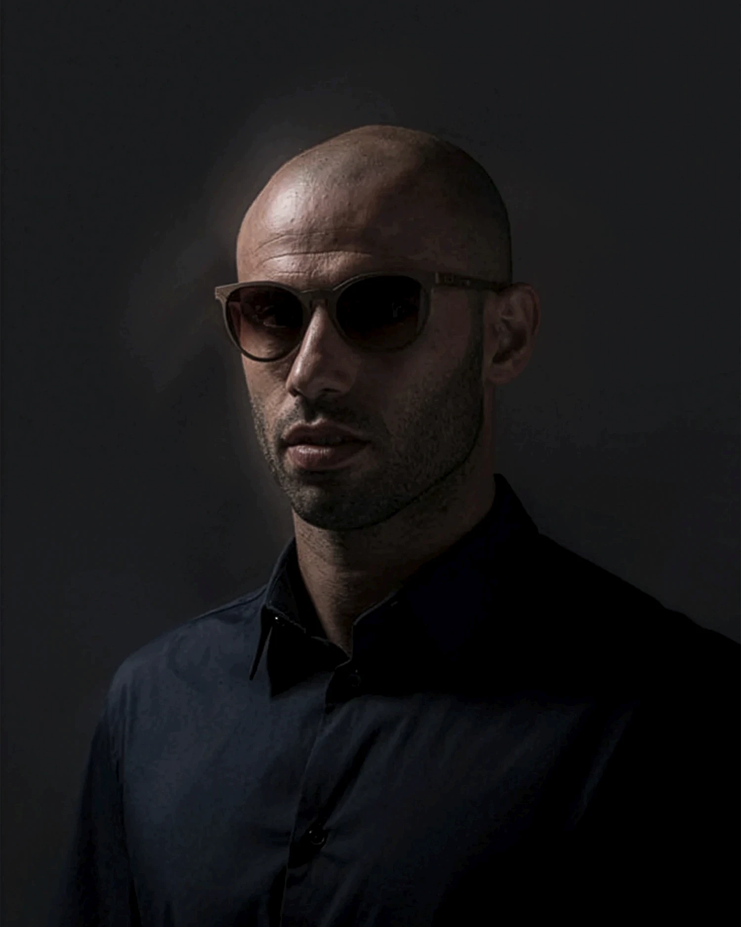 Portrait of Javier Mascherano in sunglasses and a dark shirt, packaging design by Sebastian Saavedra
