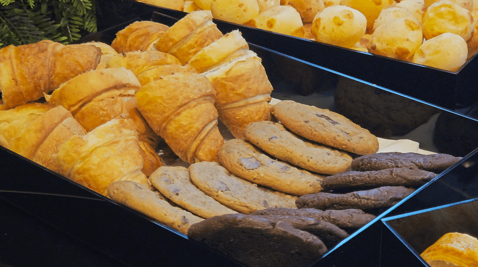 man in white shirt carrying girl in gray shirt