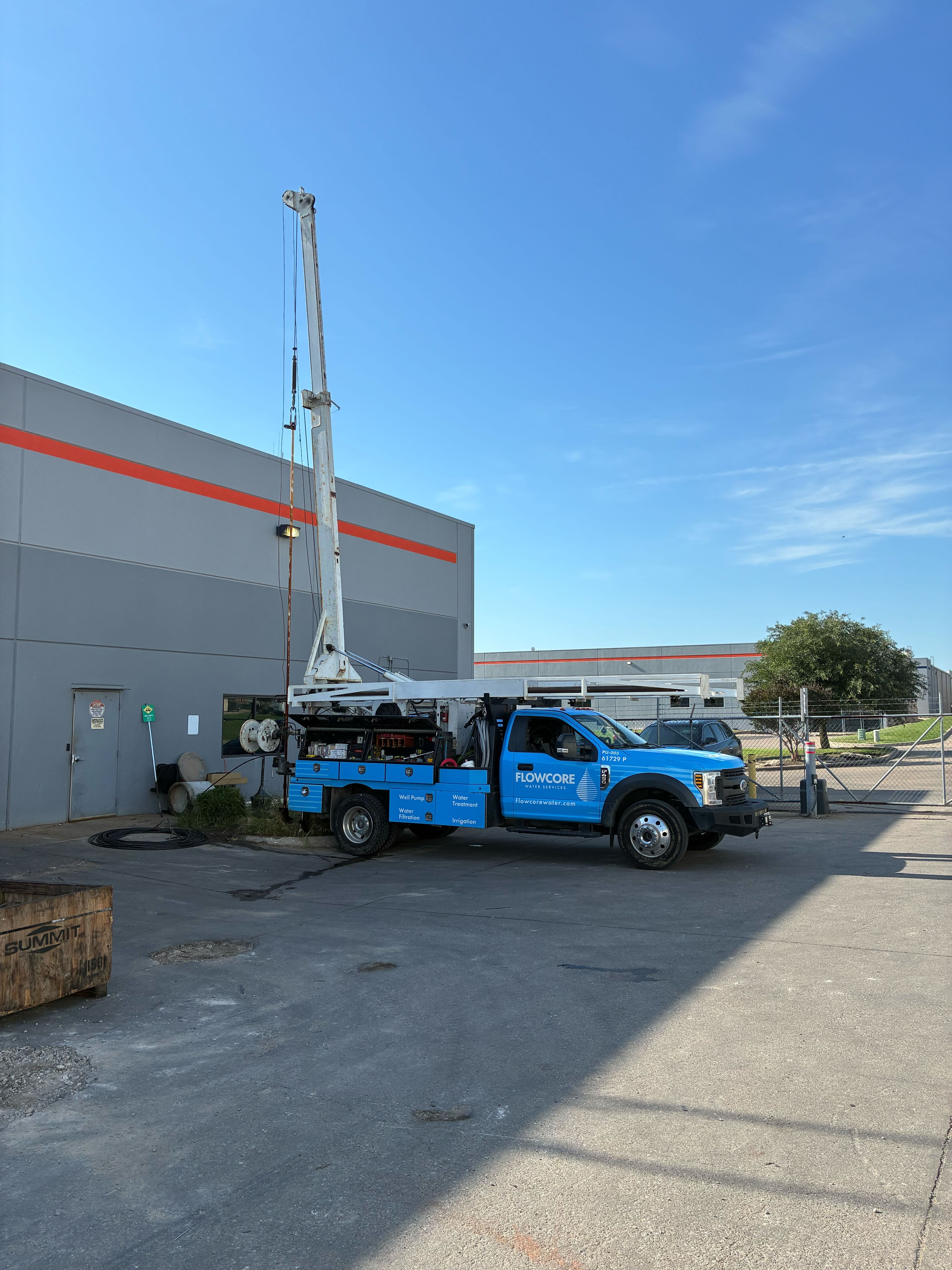 Flowcore's knowledgeable technician exits a truck with all the tools required to create the right solution for a customer's water needs.
