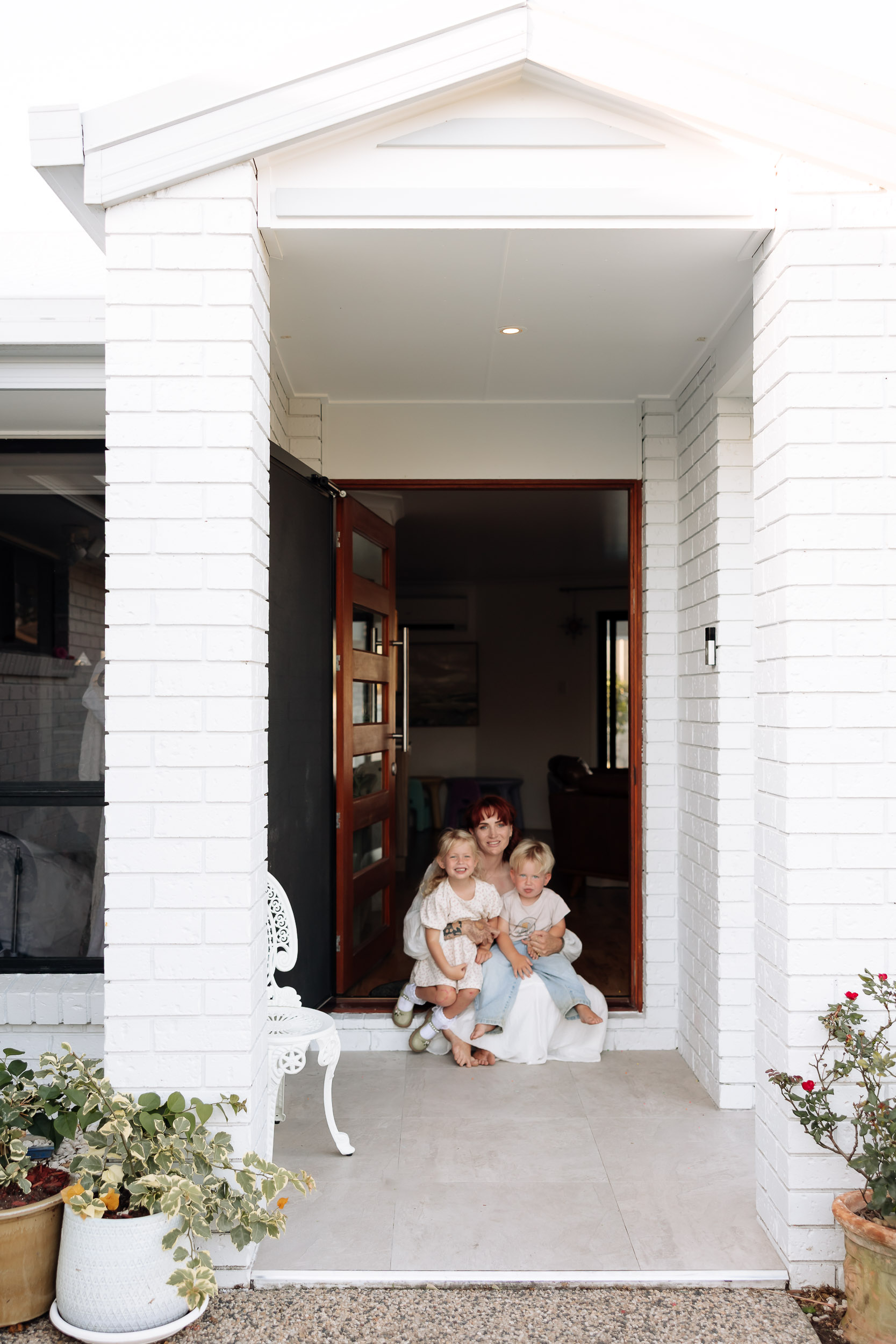 Lifestyle motherhood photography in Mackay capturing soft, candid family moments at home