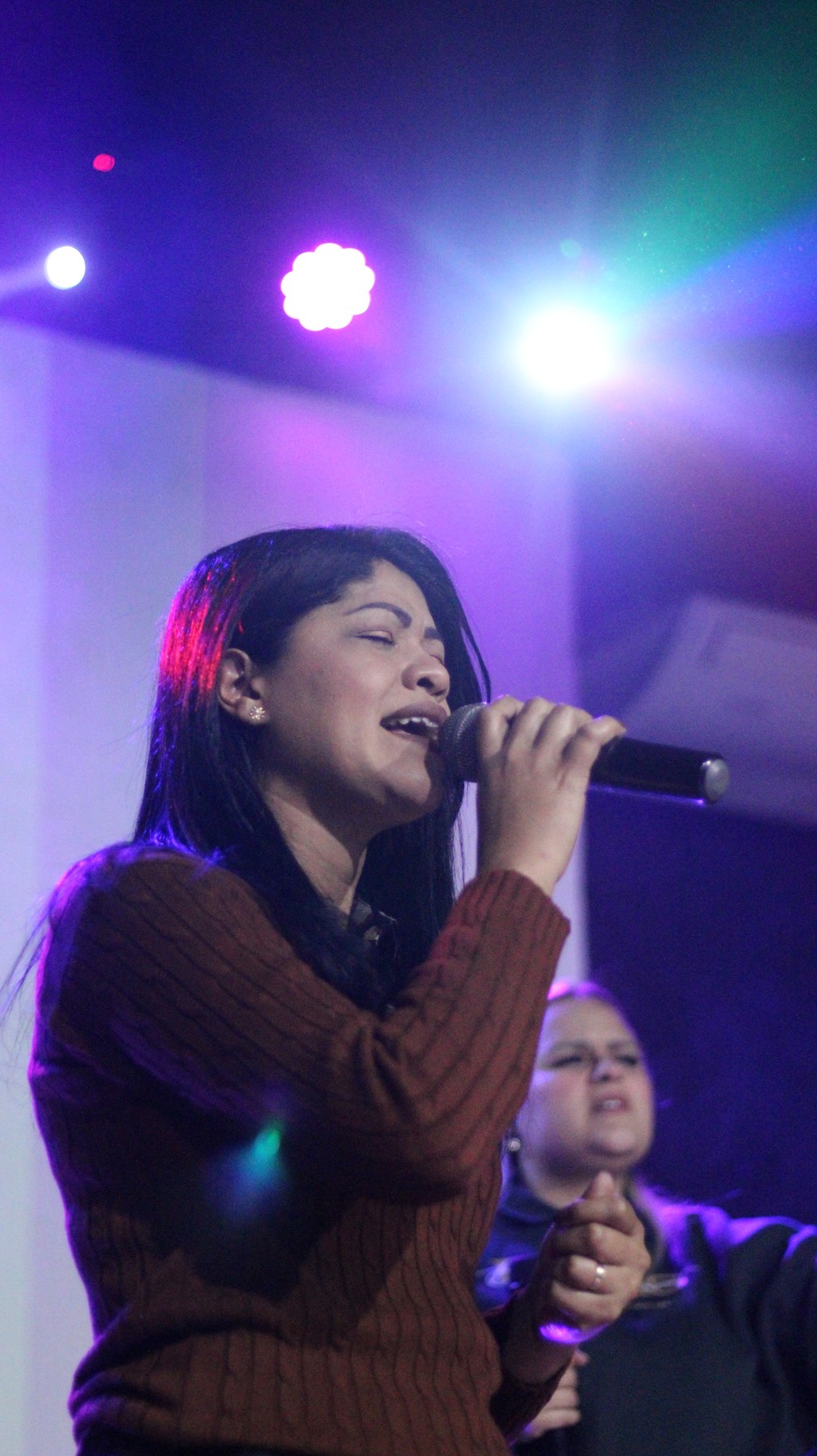 body of water under cloudy sky