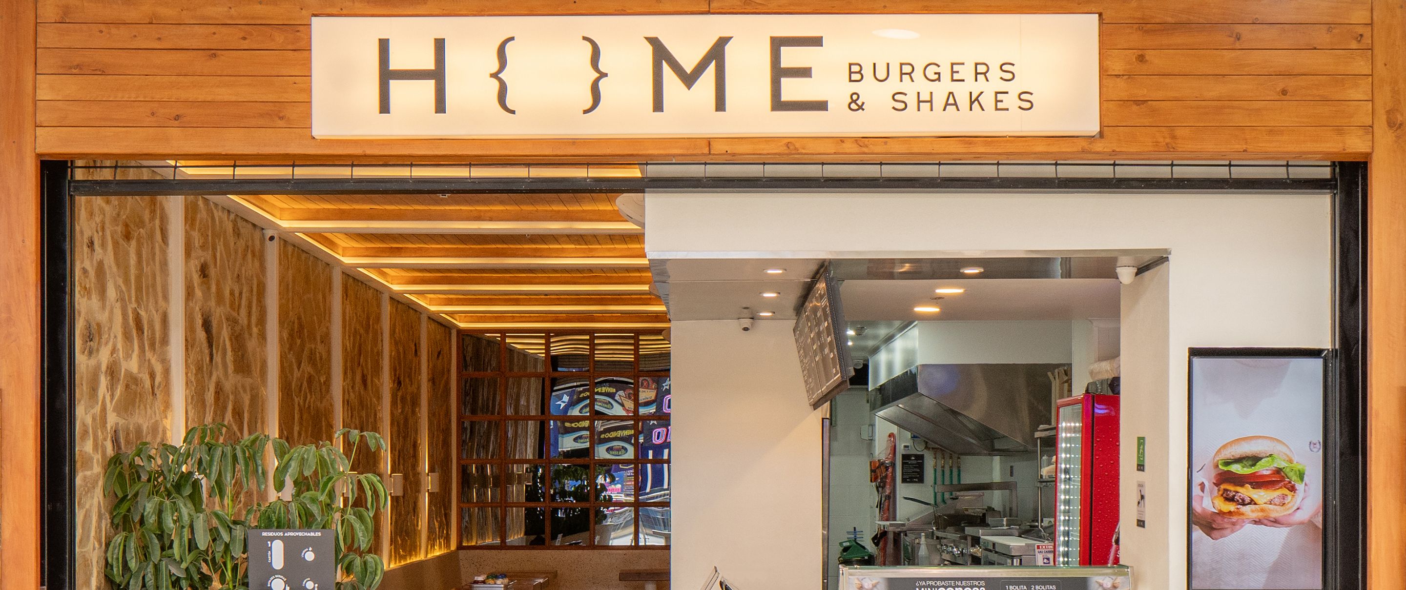 young men standing in front of a retro car