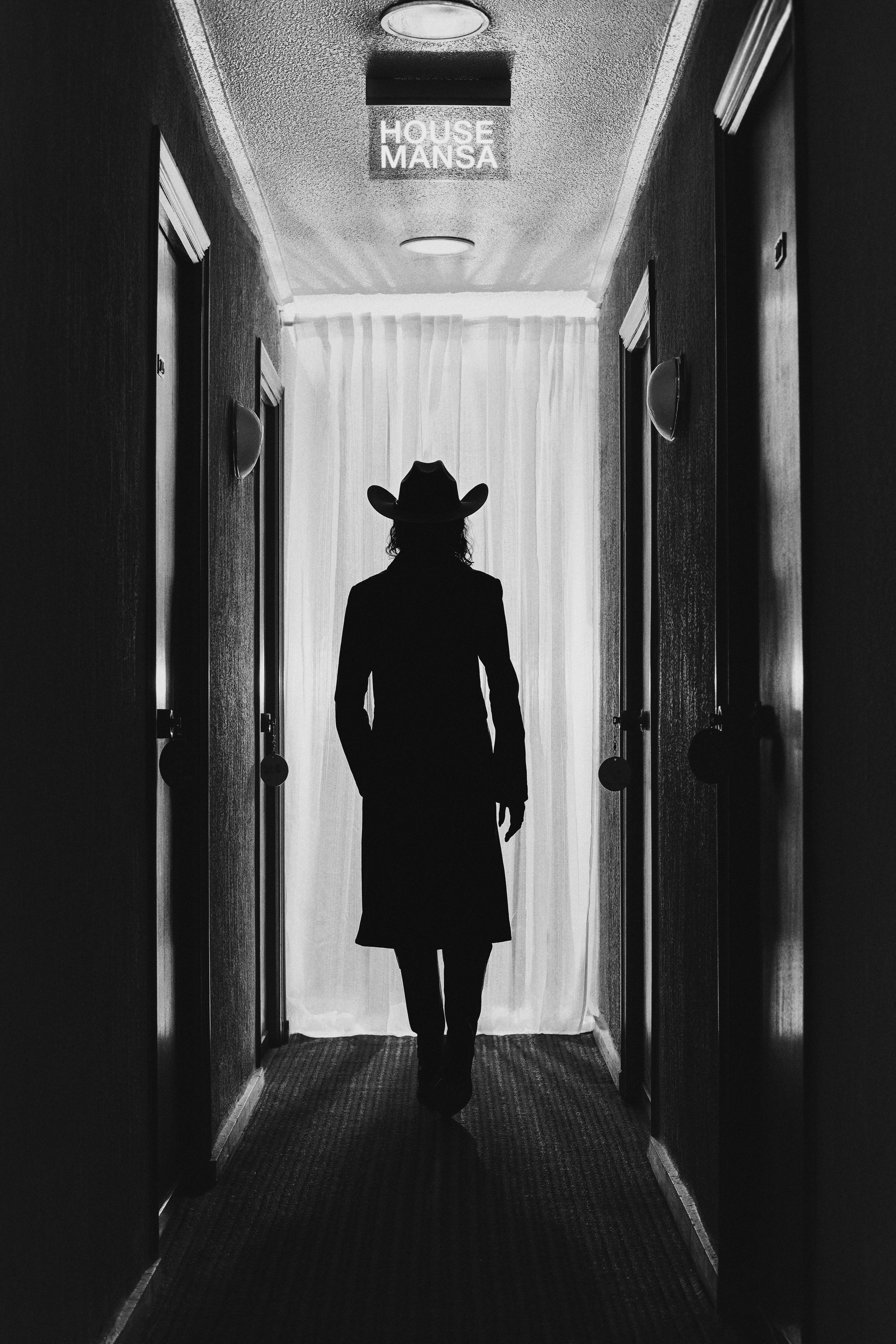 House Mansa exit sign branding