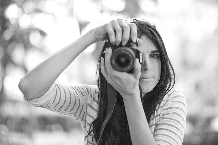 Black and white photo of man posing on camera