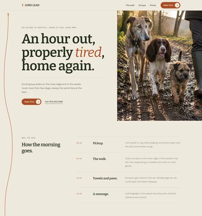 Dog walking website built with AI showing an oat paper hero, a drawn rust lead line and three dogs walking a muddy path in low winter sun