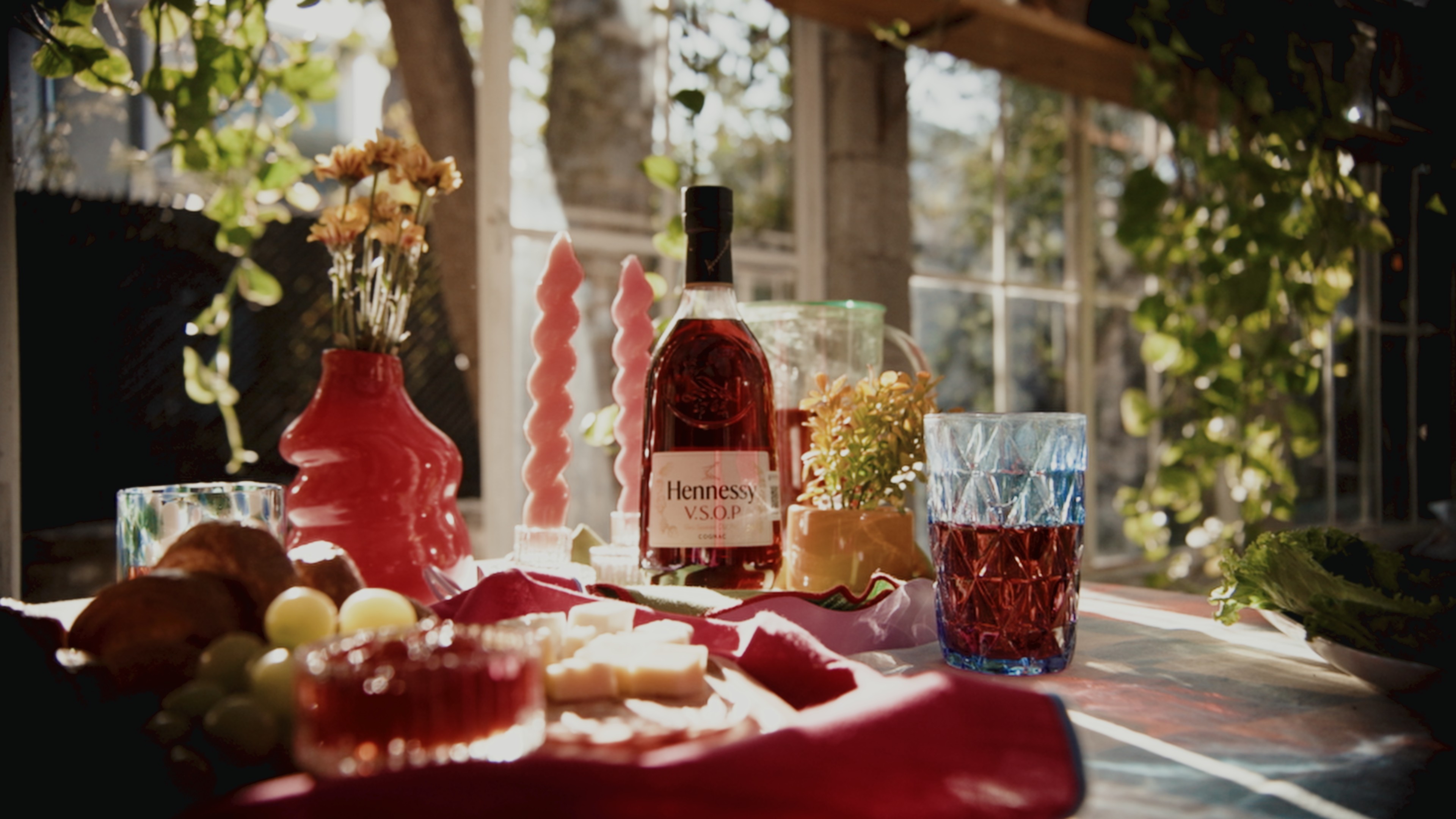 cinematic still from the Vinoteca "Summerliers" commercial, where the light reveals the essence of a shared summer experience produced by antimateria films and dir by mike bautista 