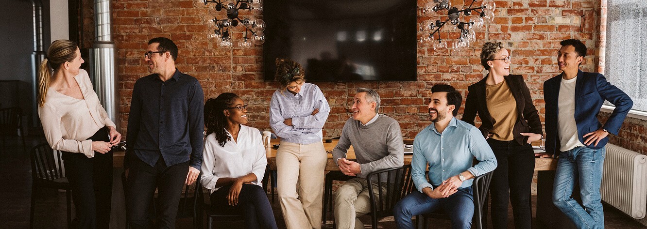 people in a room working exposedbrick