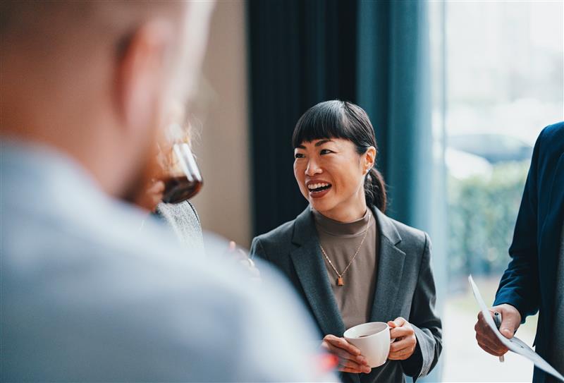 man and woman sitting on table