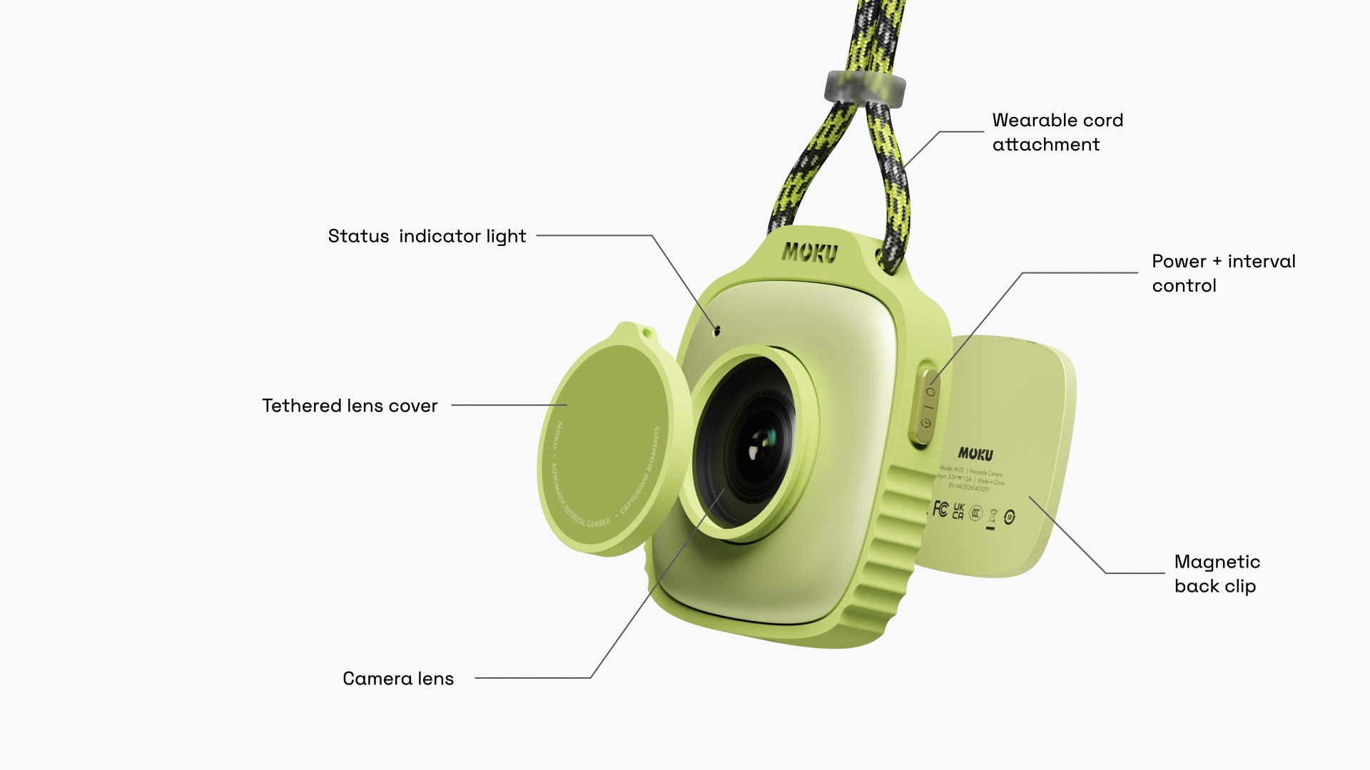 The device uses a simple screenless body, visible controls, and a tethered lens cover to support quick, low-friction use.