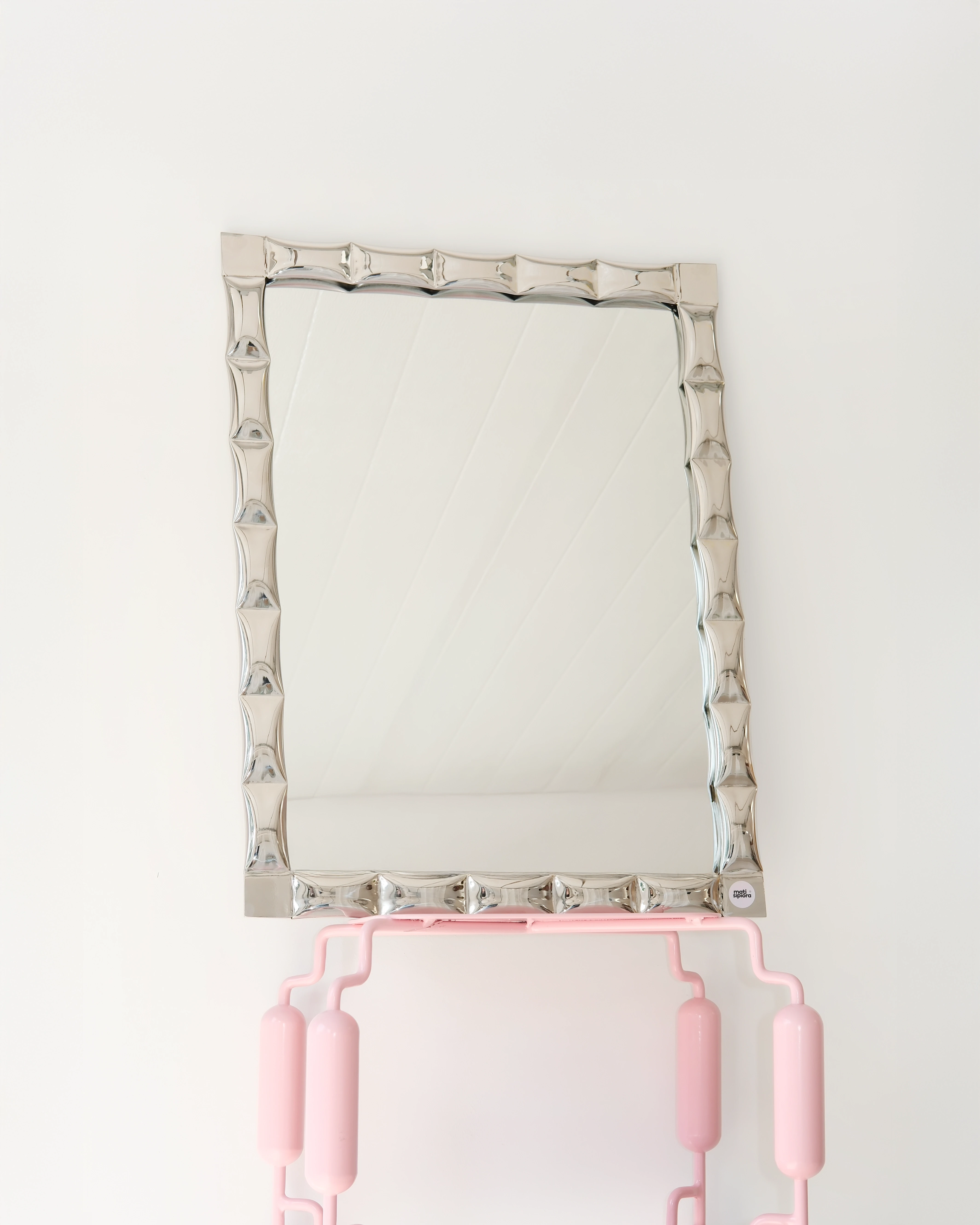Club mirror on top of Poodle shelf