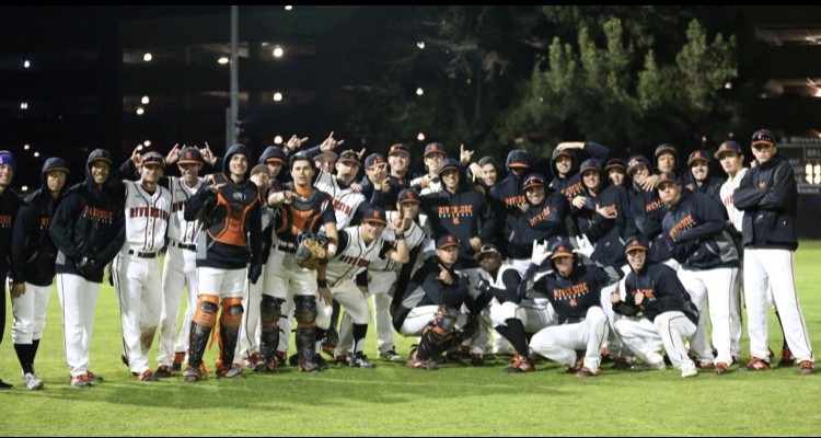 Junior Coleman posing with his college baseball team