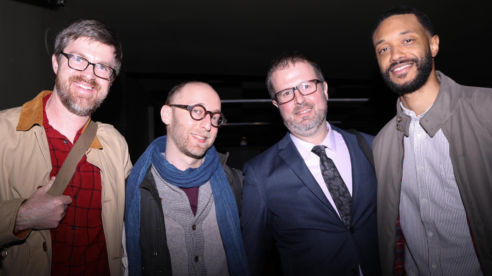 Group portrait of four men