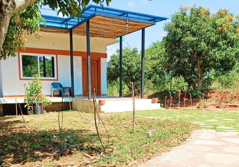 A flower-filled ring floats in fluffy clouds.