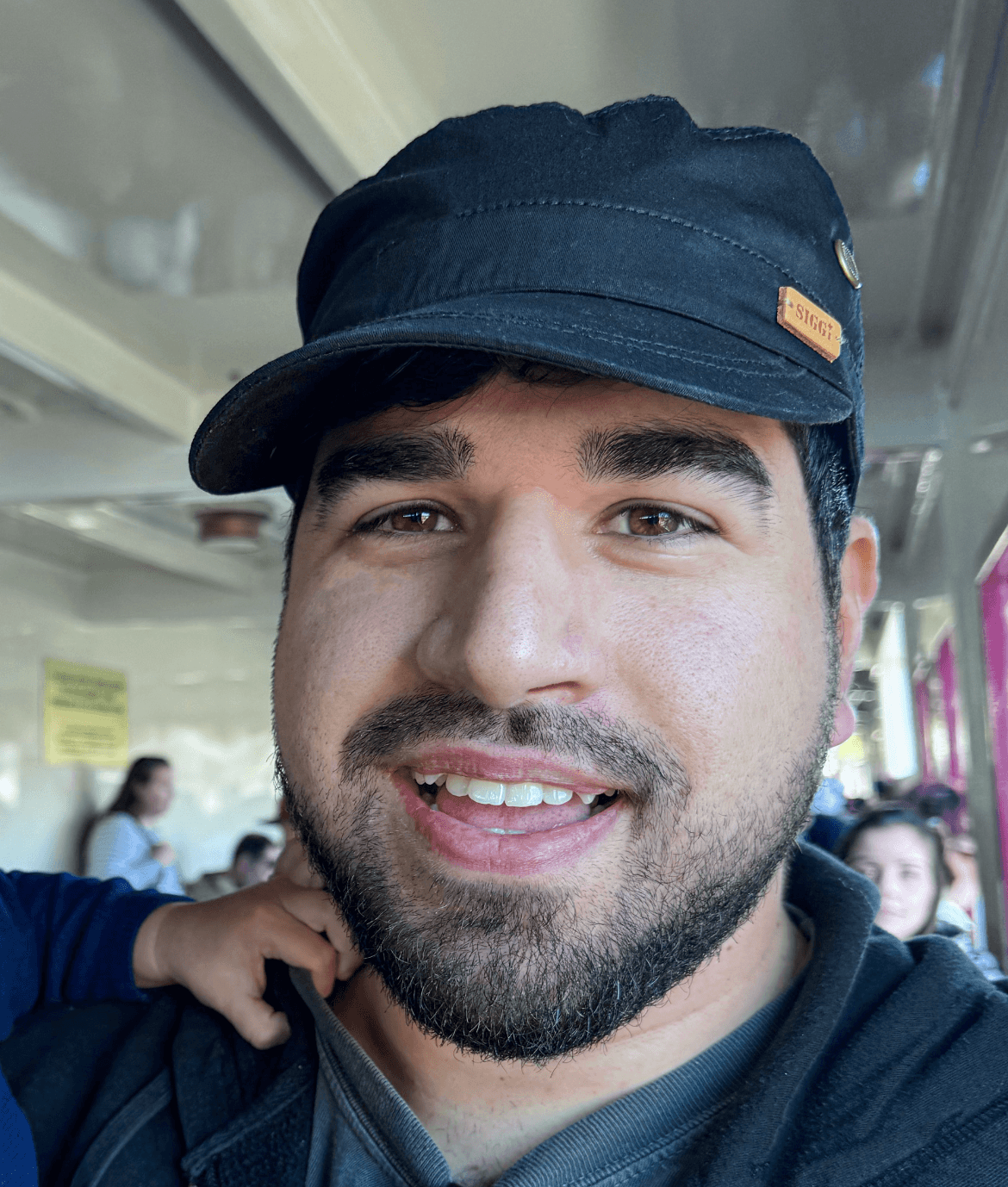 a blurry photo of a person standing in front of a wall