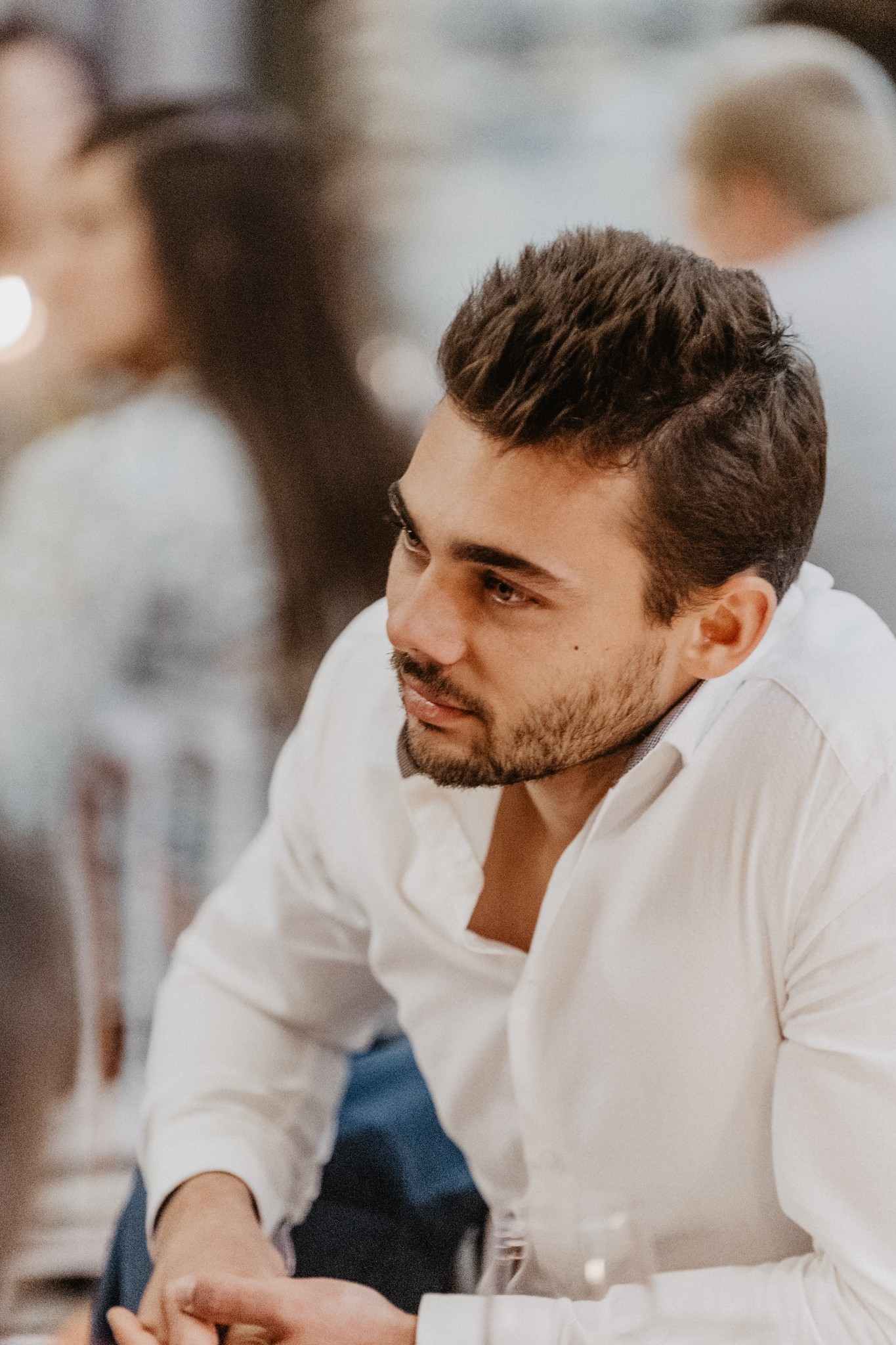 Group of people relaxing outdoors on a field or lawn