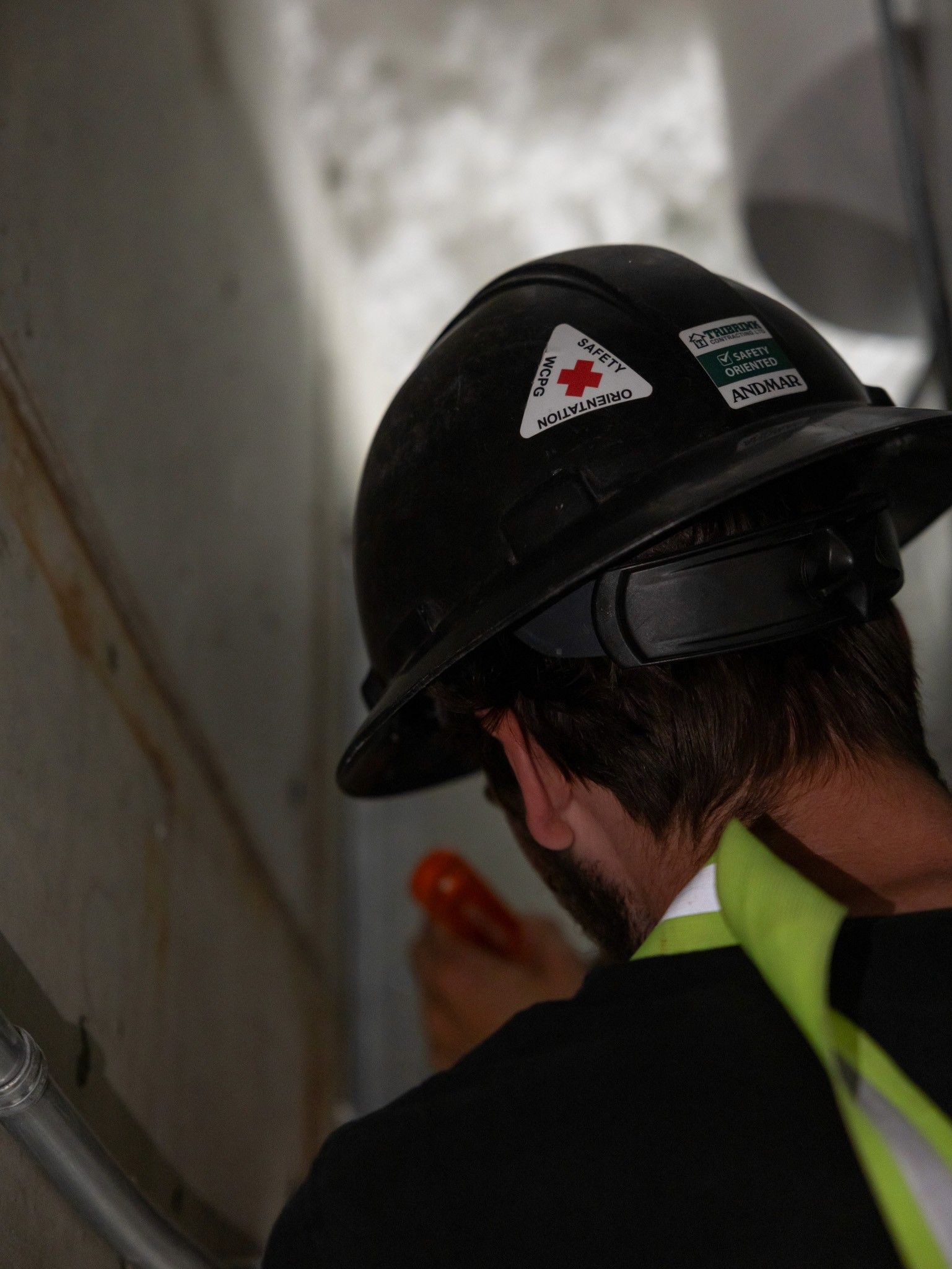 Kelowna HVAC technician wearing safety gear in British Columbia