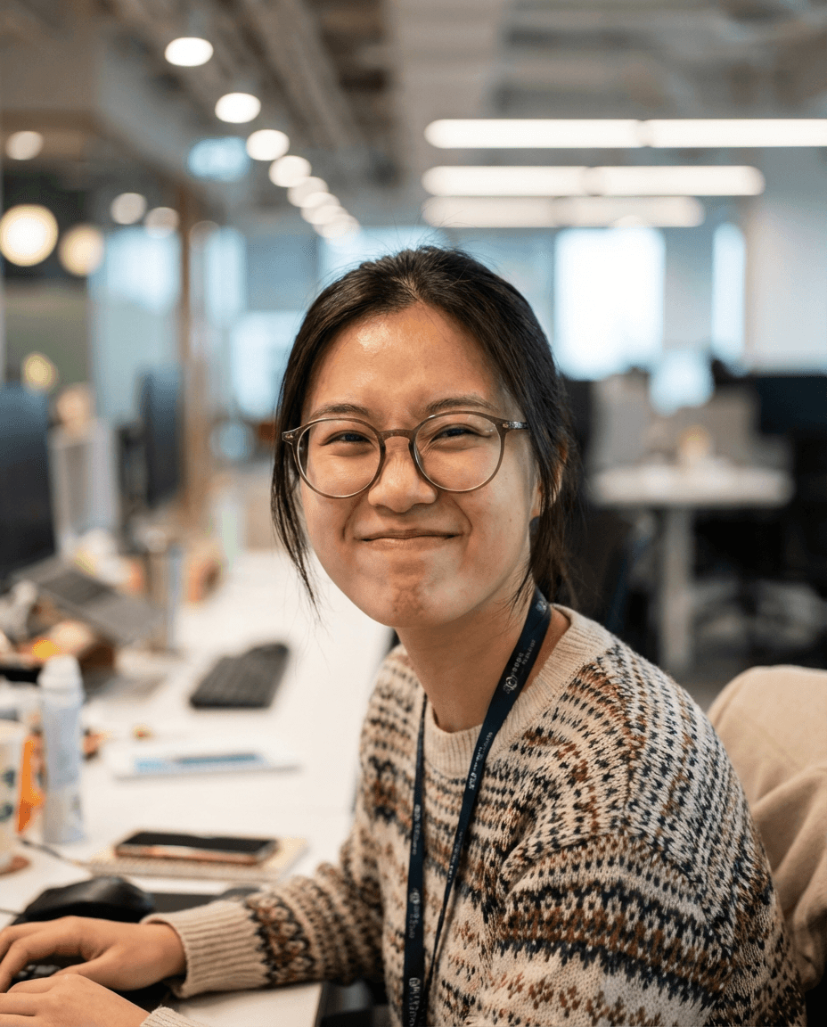 Asian SDR rep smiling about her partnership with WTFox.ai CRM