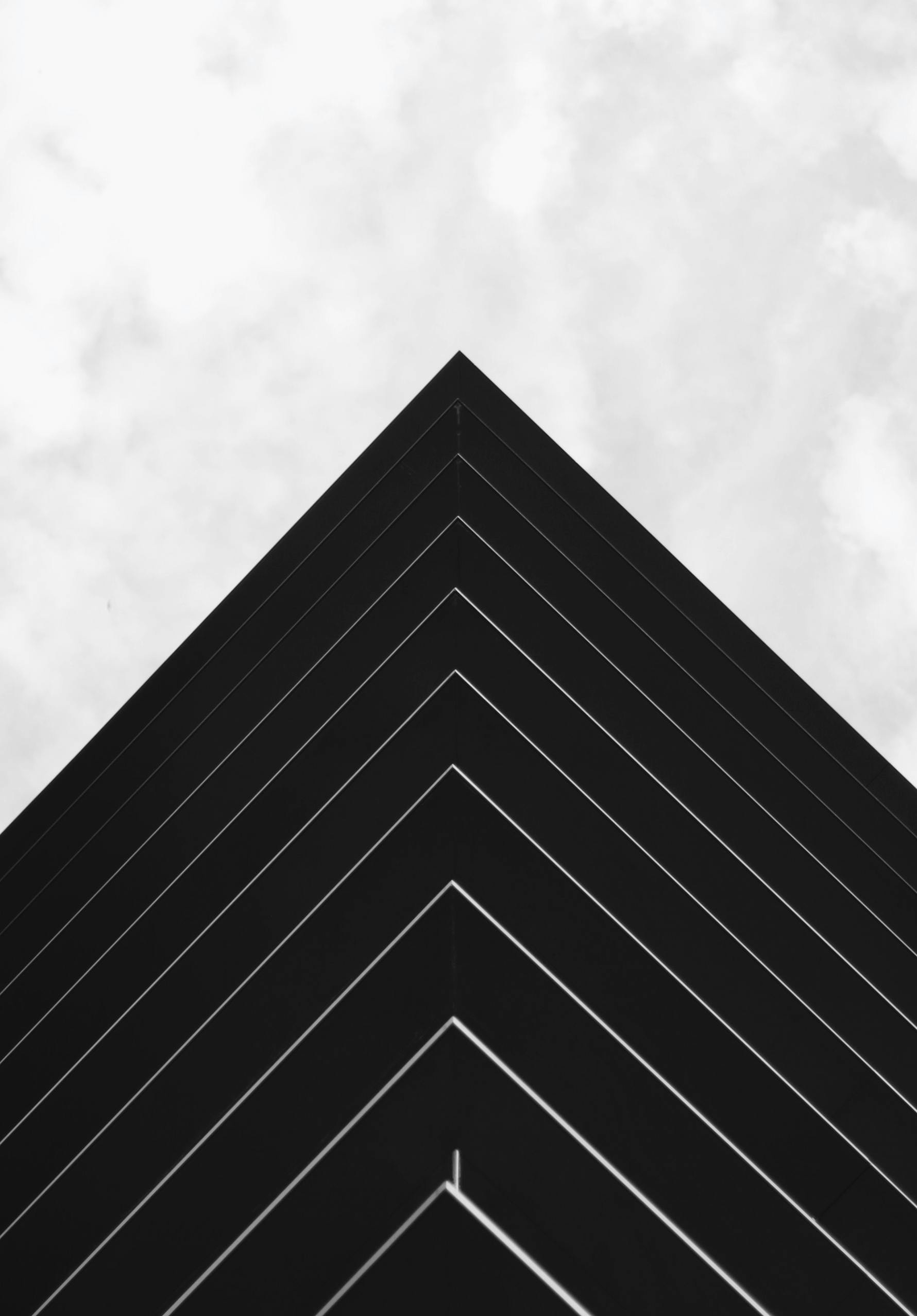 A black themed building with arrow shape.