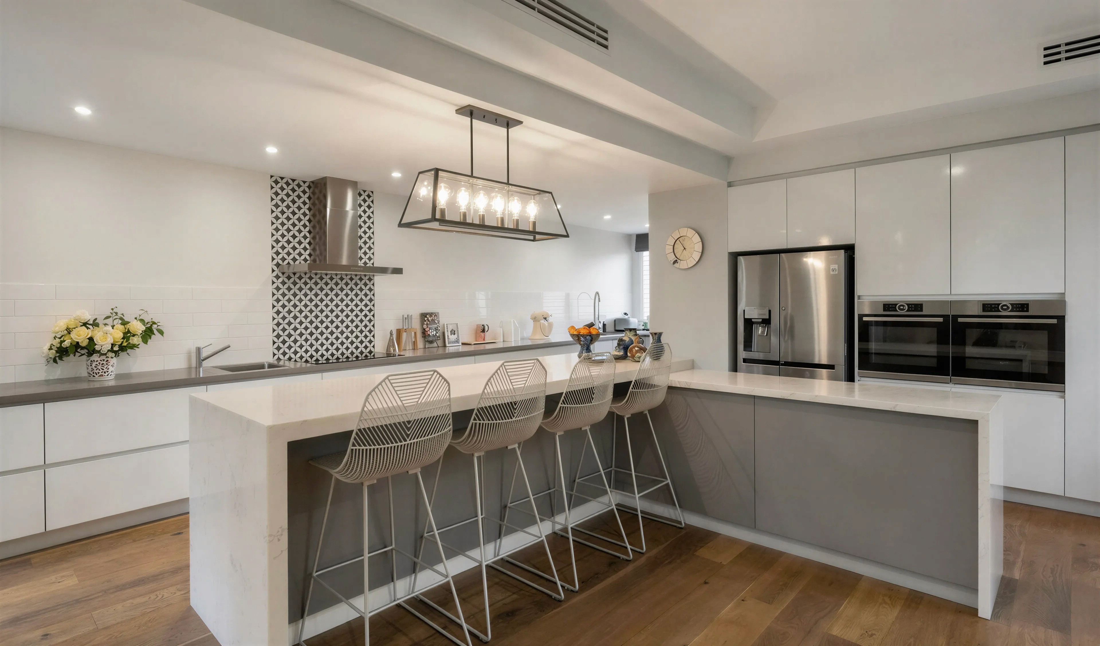Contemporary kitchen with large island bench at the Park residence