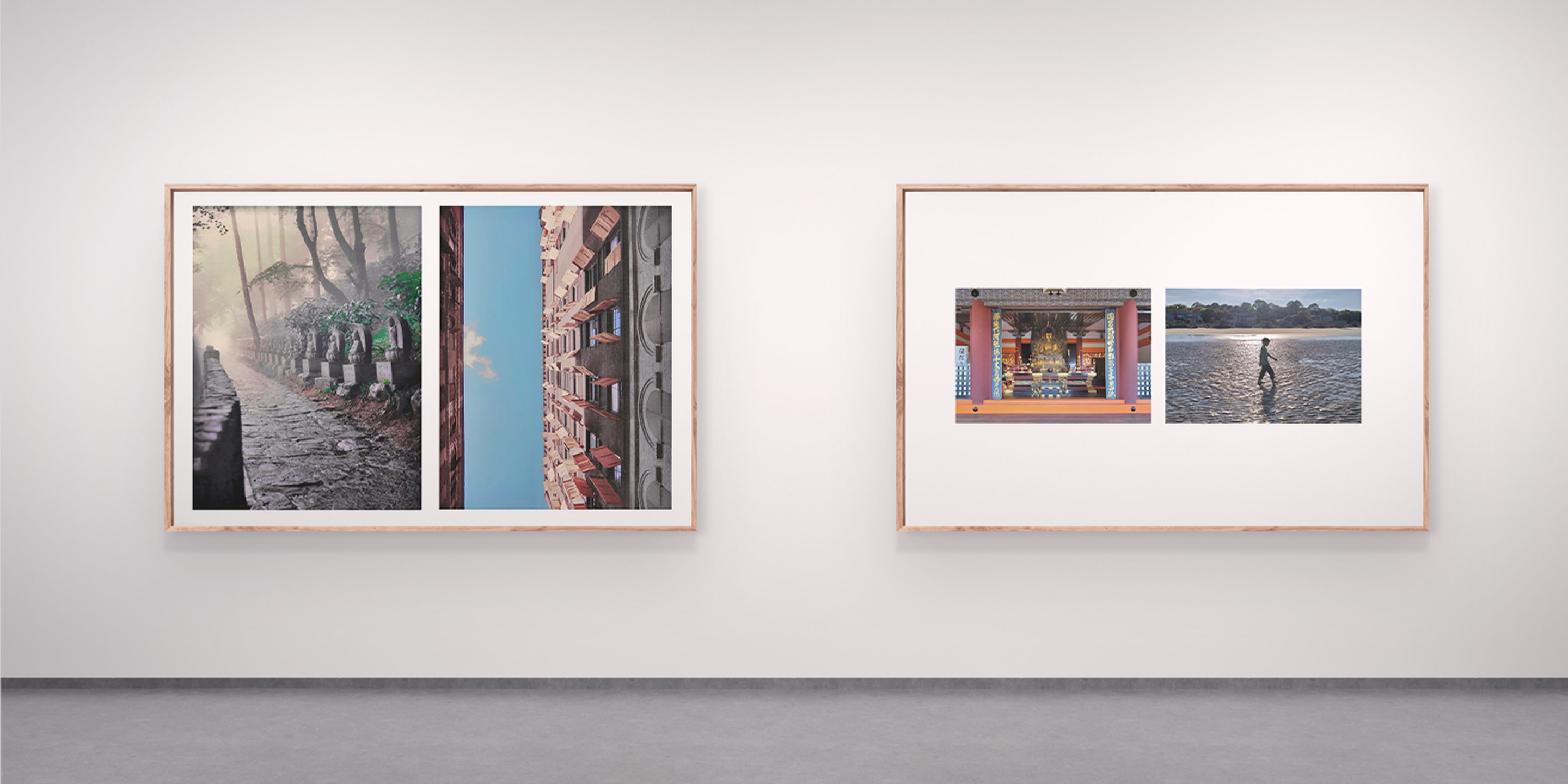 Two framed diptychs displayed in a minimalist gallery: the left pair shows a misty stone pathway lined with statues and an upward view of urban architecture against a blue sky; the right pair features a temple interior and a lone figure walking across reflective water. Together they explore stillness, symmetry, and the passage of time.