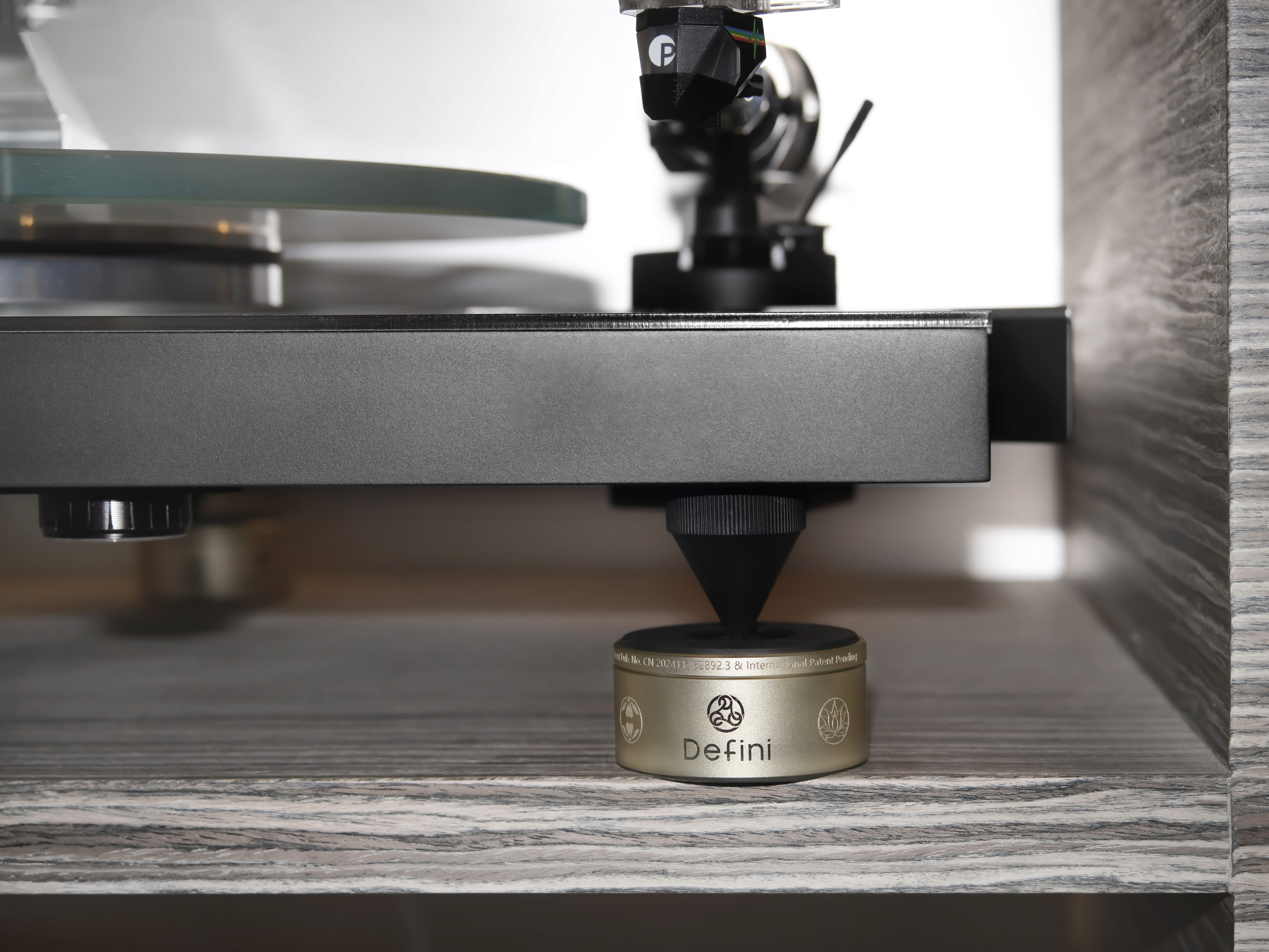 person sitting beside plastic stool