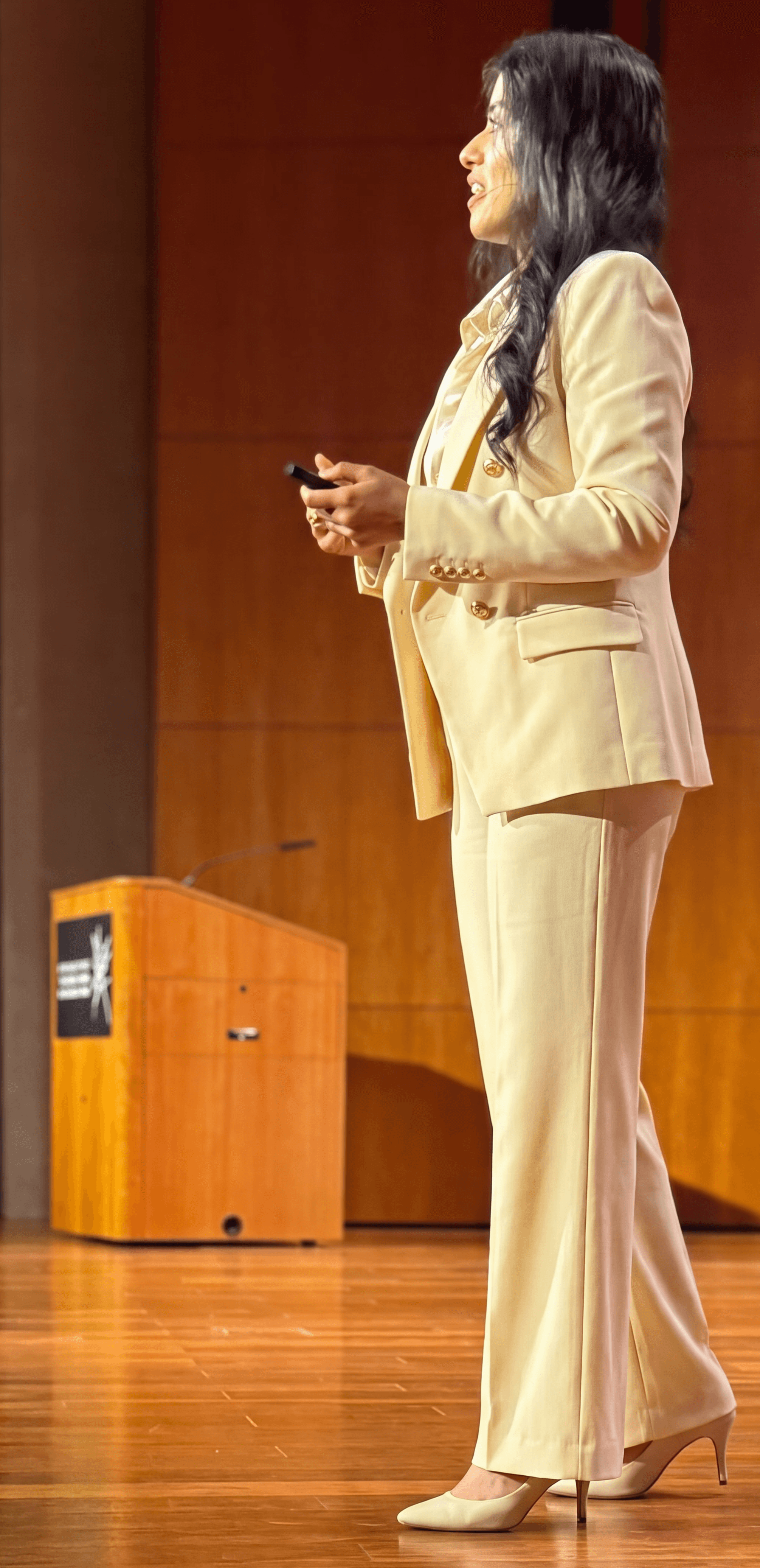 Akshata Krishnamurthy speaking on stage
