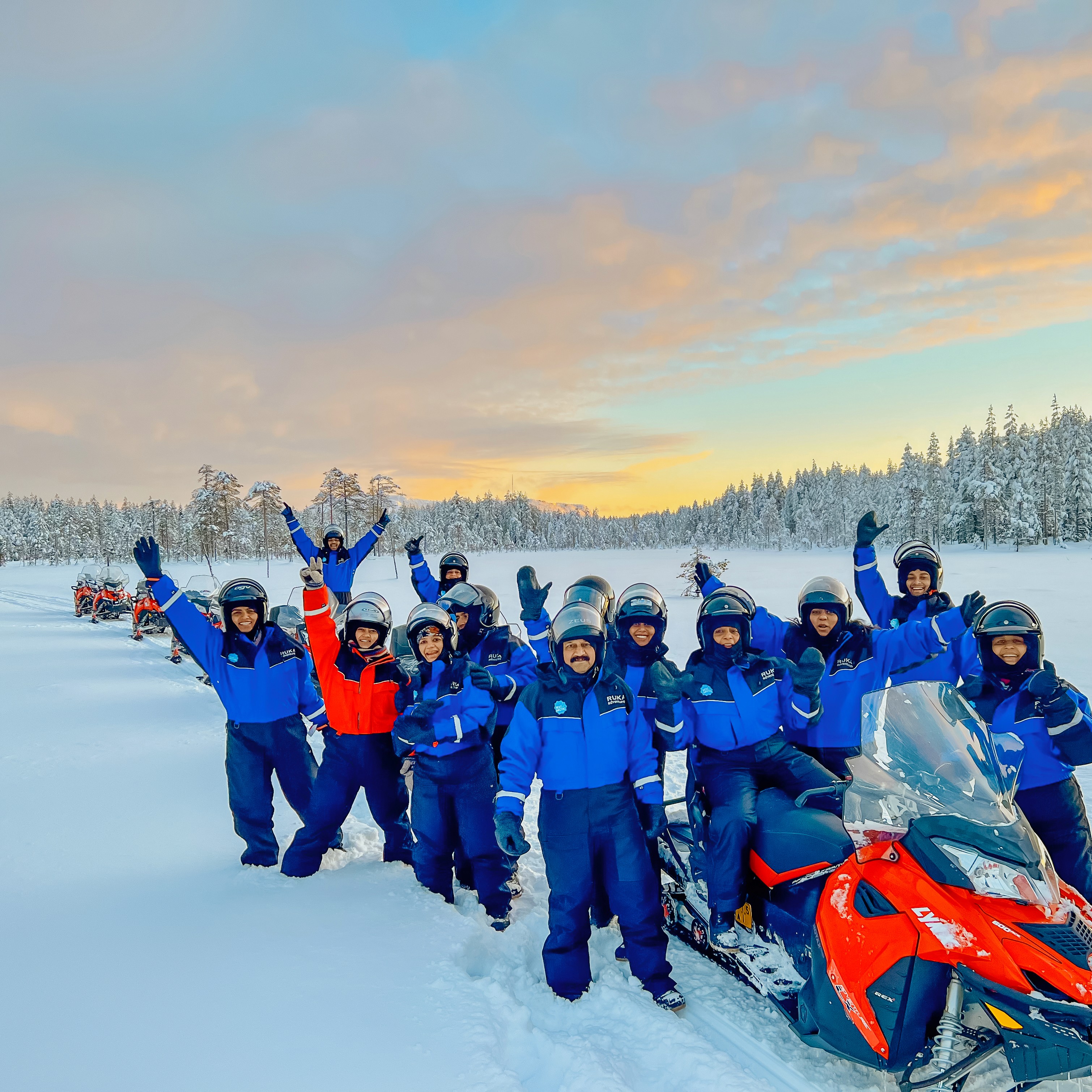 person riding on white and black snowmobile during daytime