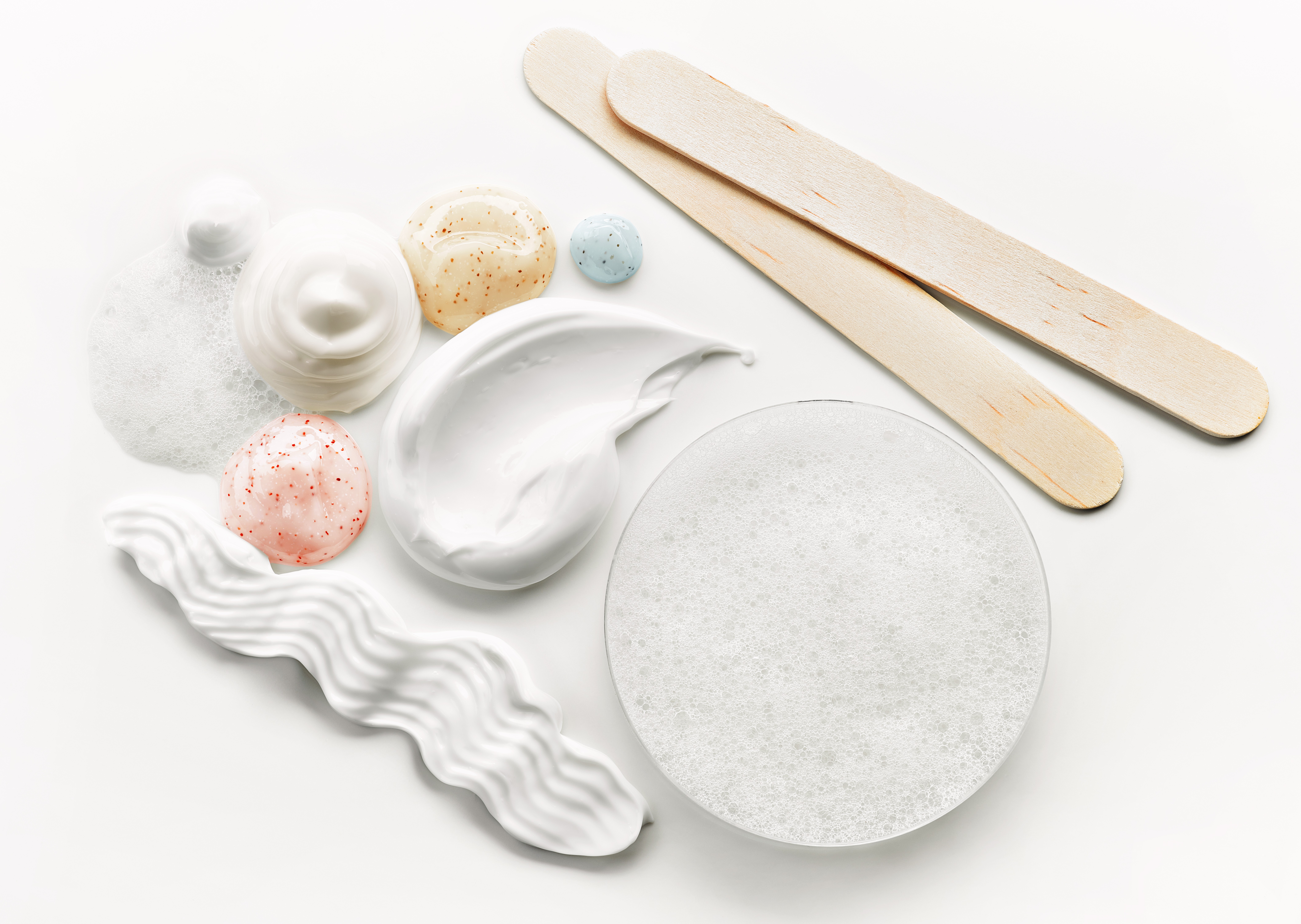 A variety of skincare creams and liquids.