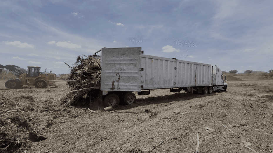 Truck unloading yard waste at Resource Group US disposal site